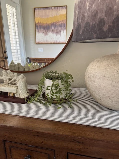 Mixed indoor plantings creating warmth and texture and a Boise home before.