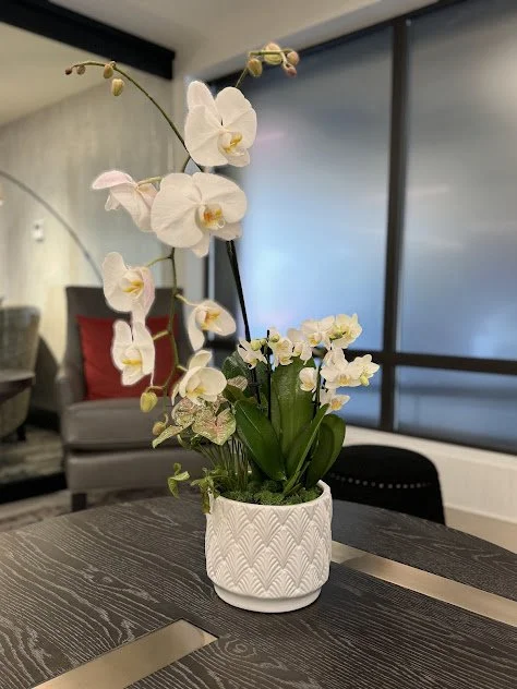 All white, very elegant and classy orchid arrangement for a high end hotel in downtown Boise, Idaho.