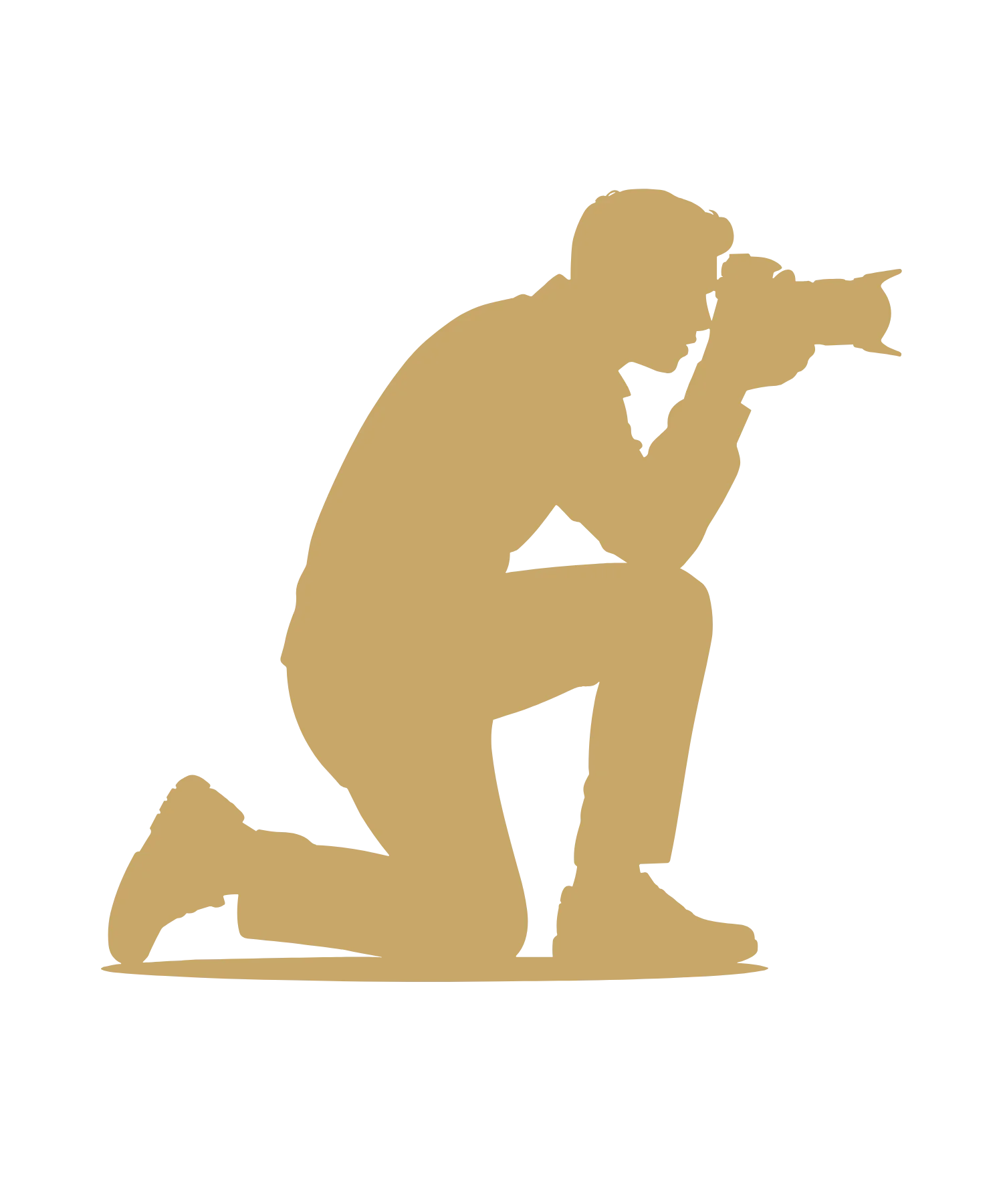 Silhouette of a person kneeling on one knee, holding a camera and taking a picture
