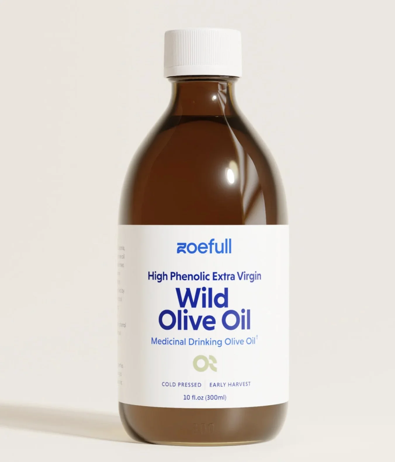 A brown glass bottle of Zoefull high phenolic extra virgin wild olive oil with a white cap and a white label with blue text showing it is medicinal drinking olive oil, cold pressed, early harvest, 10 fl oz (300 ml).