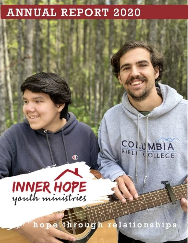 The cover of an annual report from 2020 features two young men outdoors in a forested area. One is holding a guitar, and both are smiling. The report is for Inner Hope Youth Ministries, with the tagline "hope through relationships."