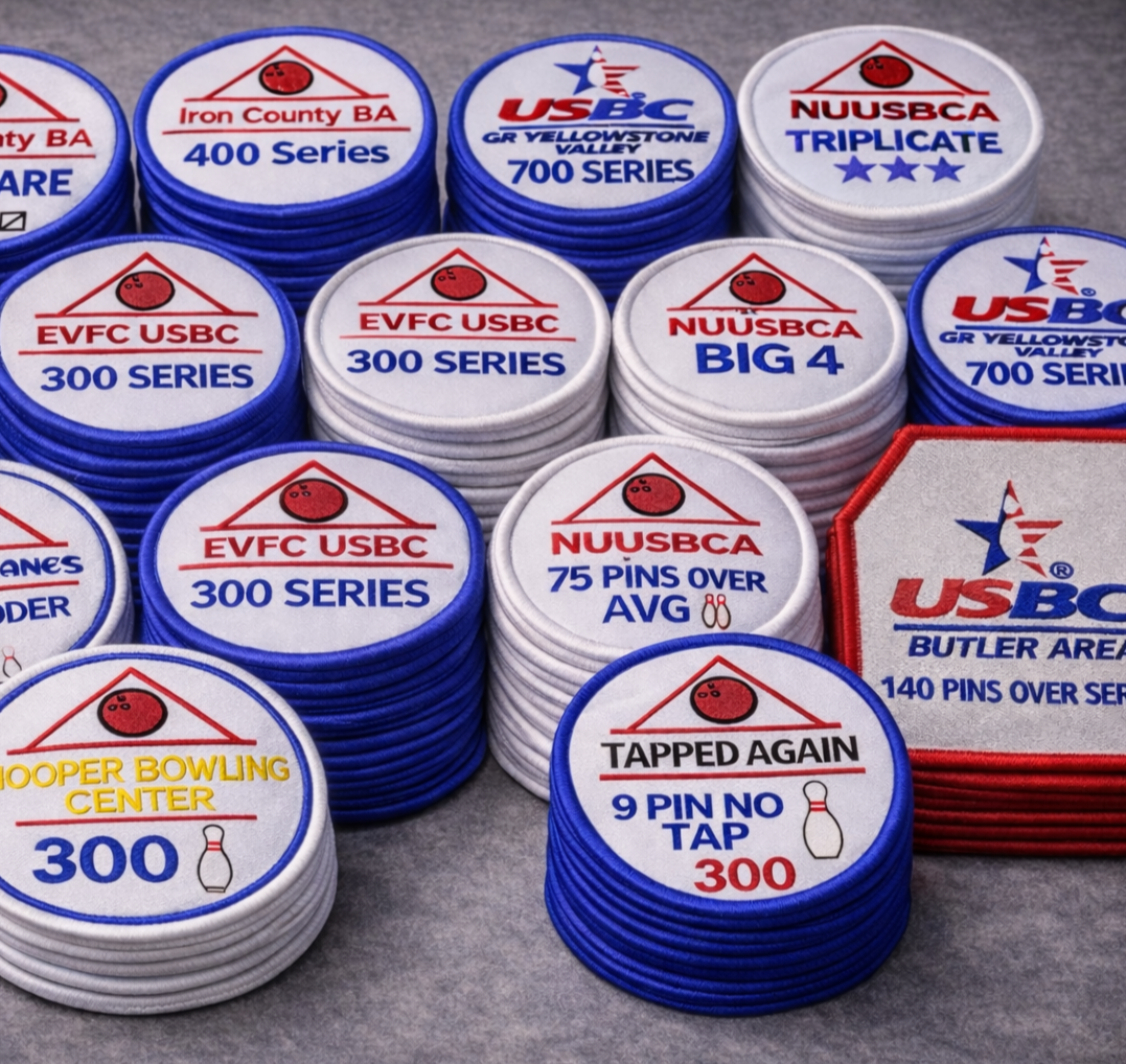 Stacks of blowing patches for USBC bowling, featuring various series and formats like 'All Spare,' '400 Series,' '300 Series,' 'Big 4,' 'Butler Area,' and others, with different colors and logos.