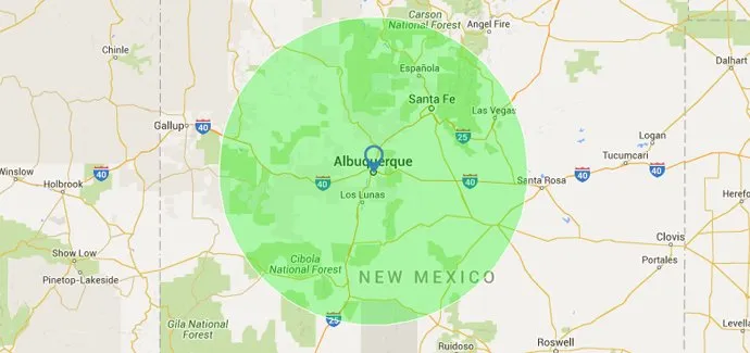 Map highlighting Albuquerque, New Mexico, with a green coverage radius extending to surrounding areas including Santa Fe and Las Vegas.