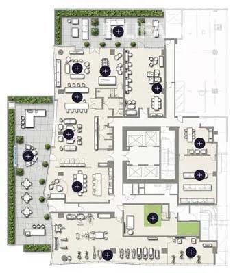 Floor plan of an office space with multiple work areas, meeting rooms, lounge, kitchen, restrooms, and outdoor patio.