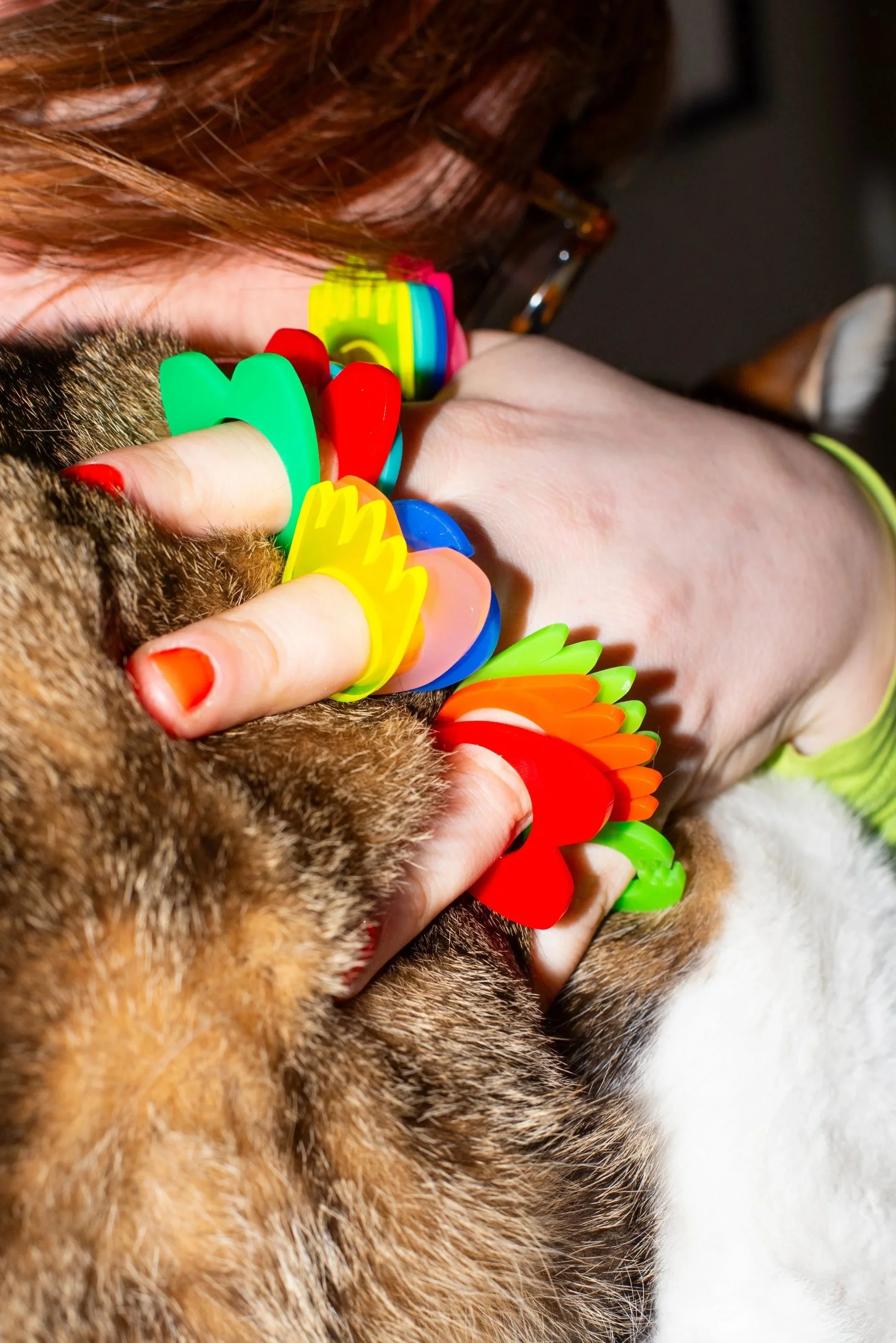 Creative, Funky product photography of colourful handmade Claddagh rings by Irish artist Áine Byrne”