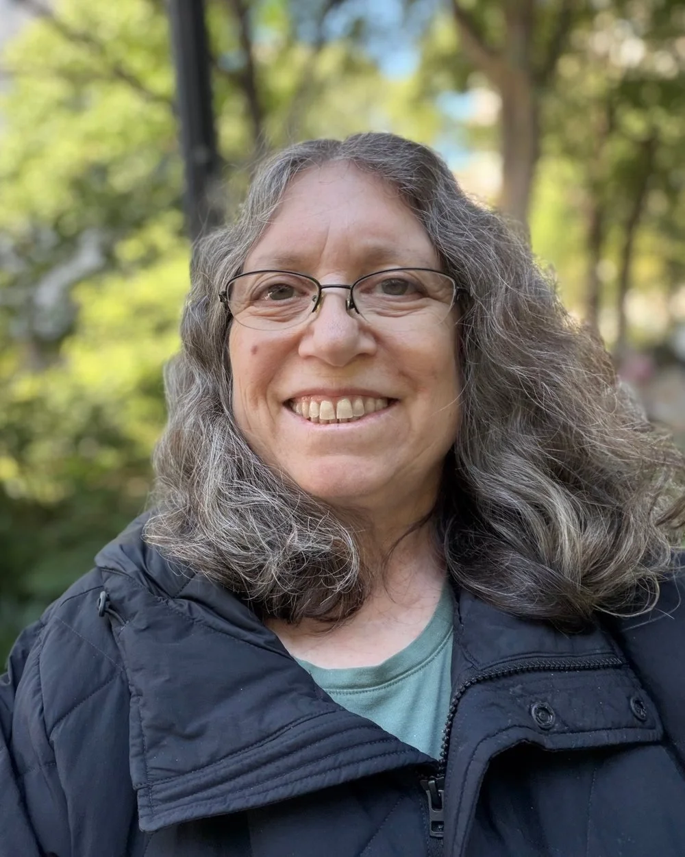 Karen Bromberg outdoors, smiling