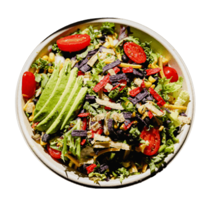 southwest crunch salad with fresh avocado, black beans, corn, and tortilla strips