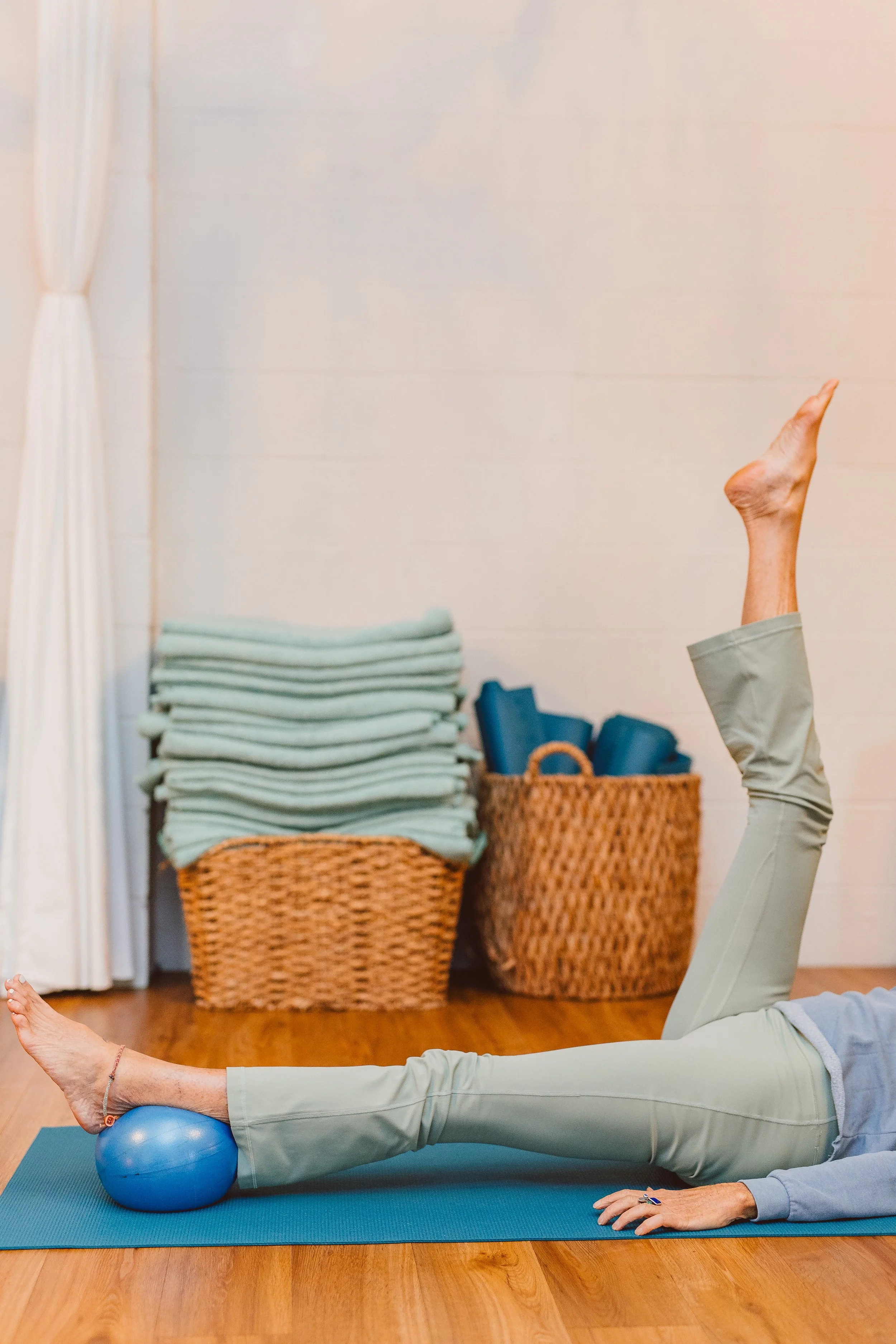 Pilates props and yoga mat setup at Coastal Retreat Studios in Easton, MD — mats, blocks, and balls ready for a somatic yoga or Pilates class