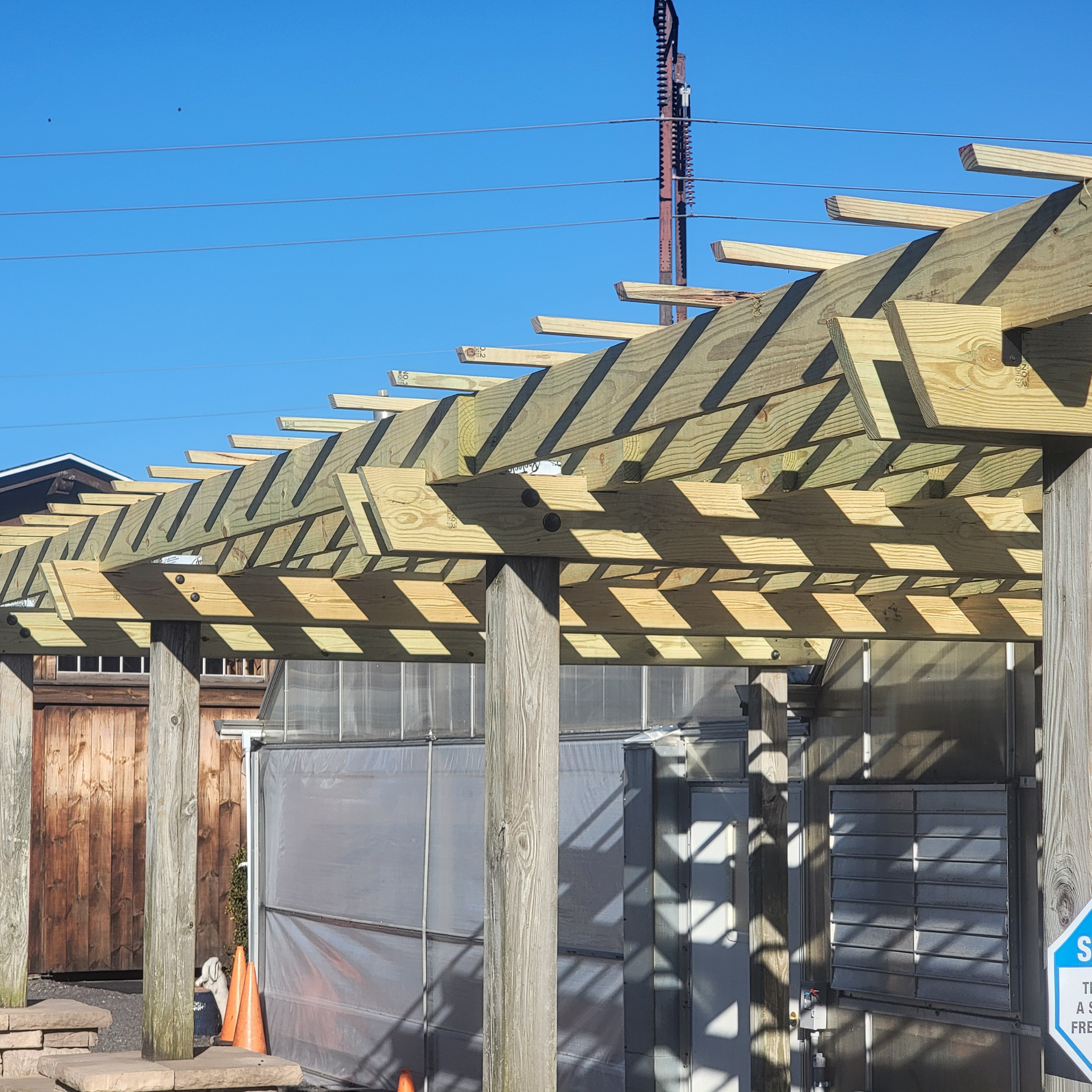 Side view of pergola structure built by Diggs Design Studio.