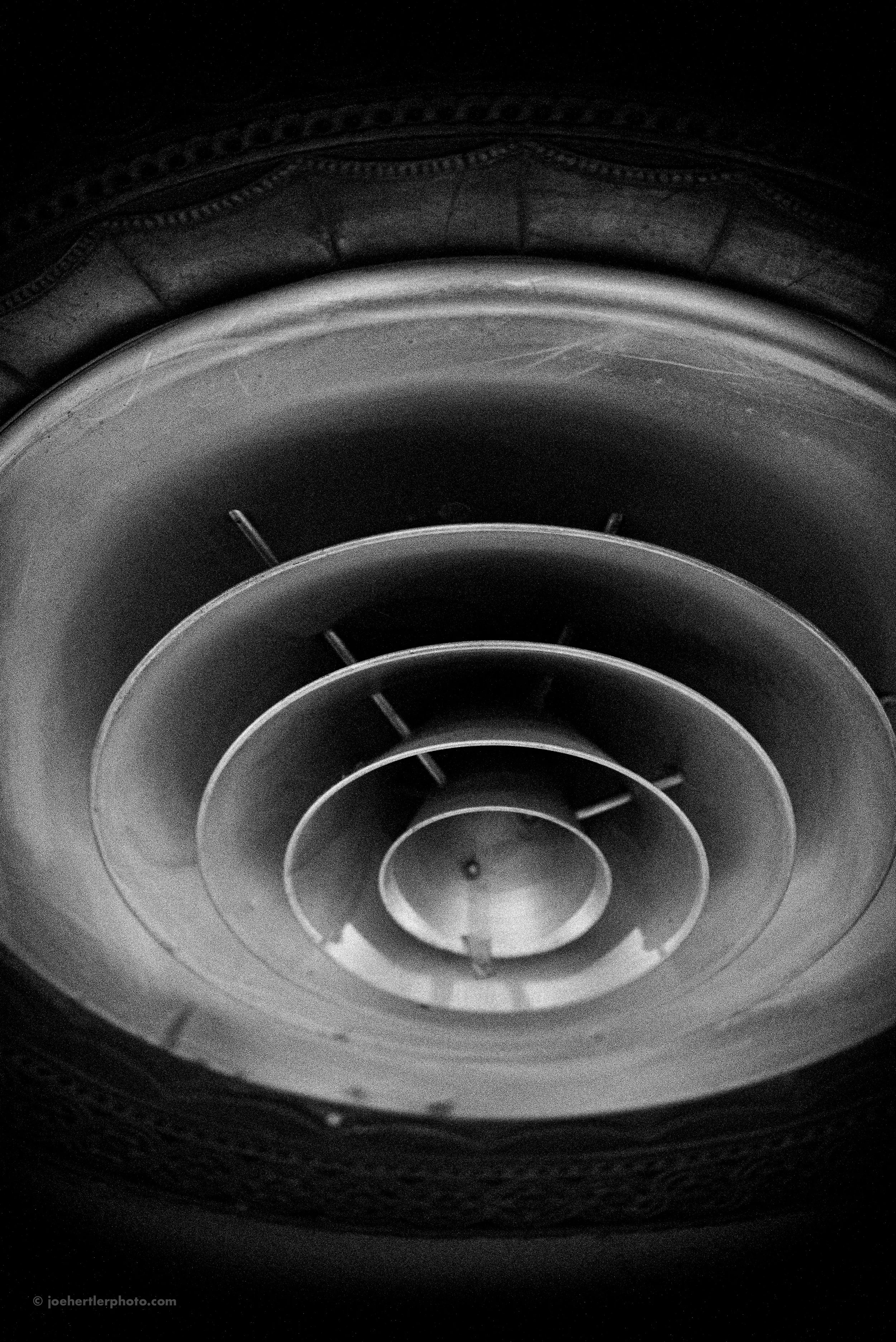 Close-up of a car wheel with a detailed view of the rim and tire tread.