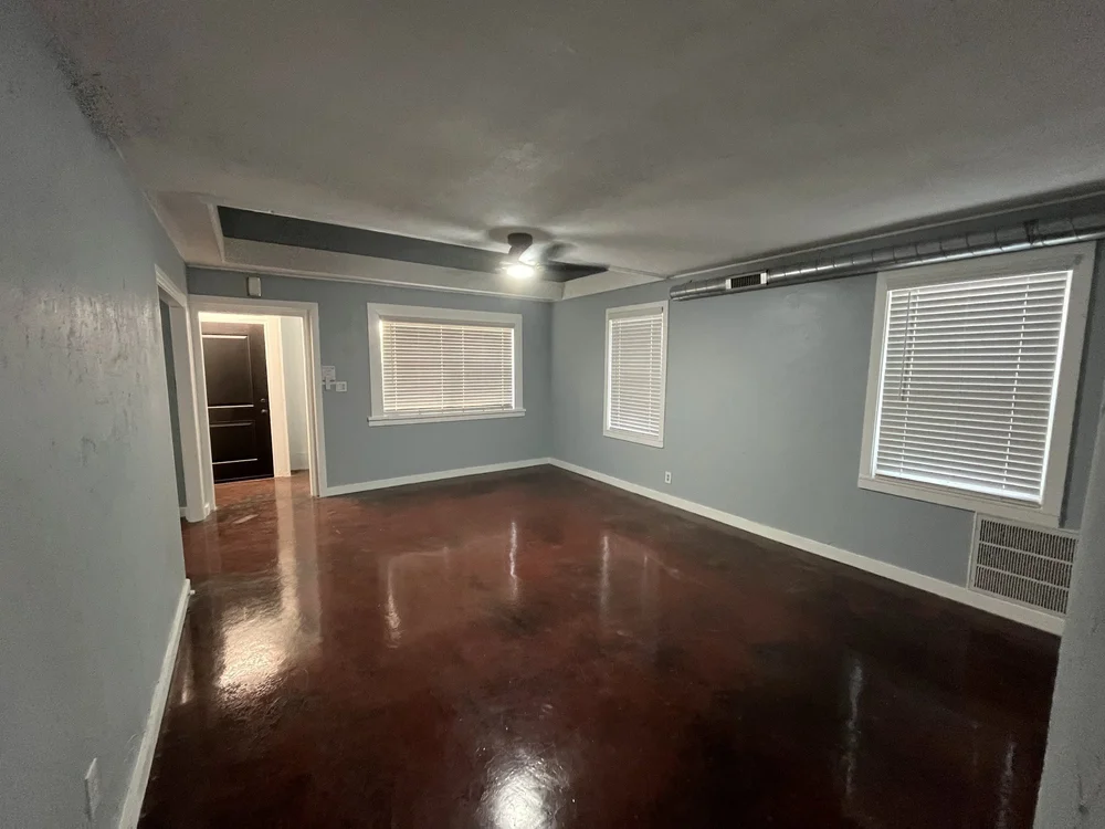 Light blue interior walls and white trim in the Norman Home Refresh project
