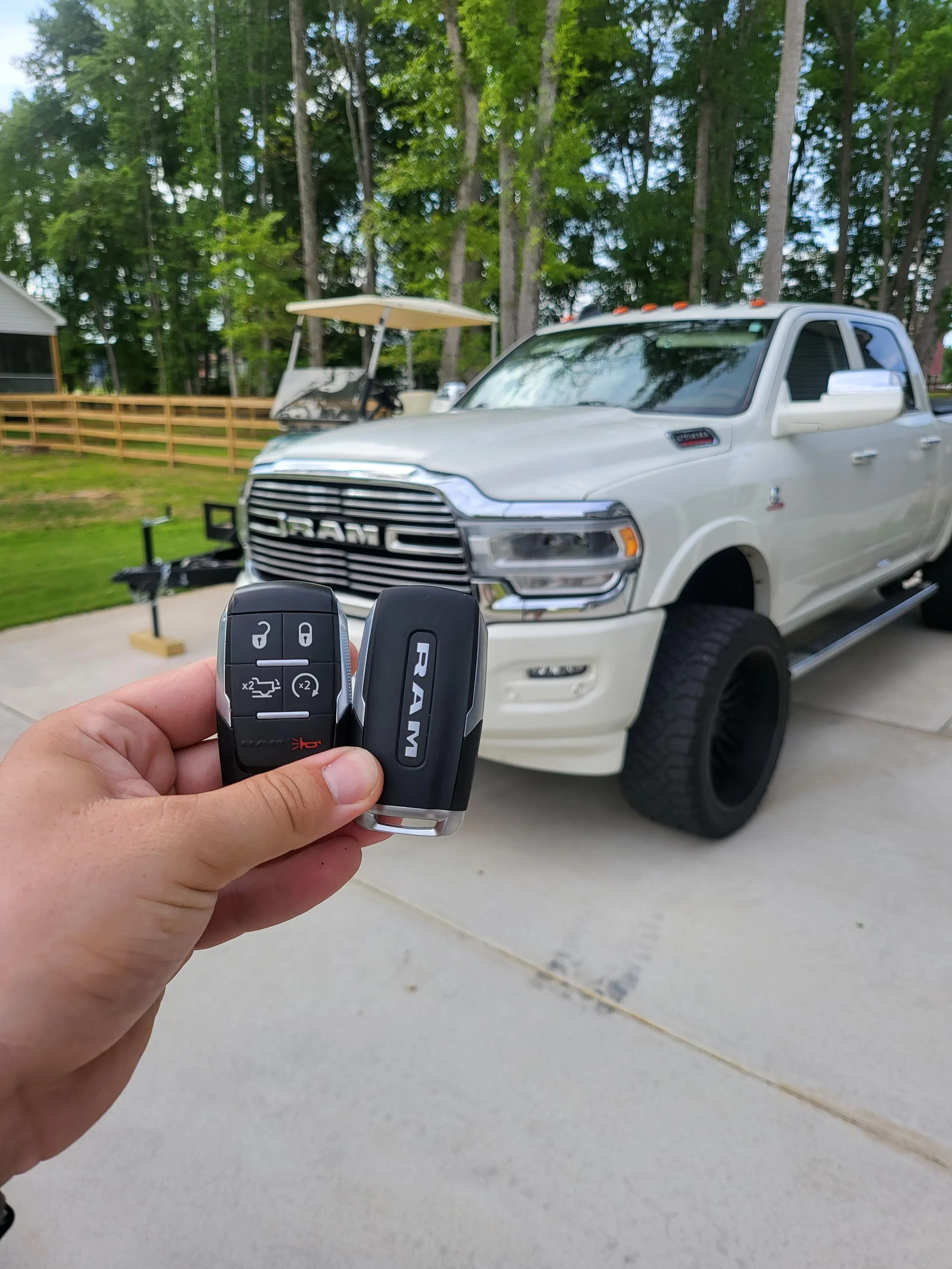 Expert Locksmith replacing a car key for a driver in Raleigh Durham NC