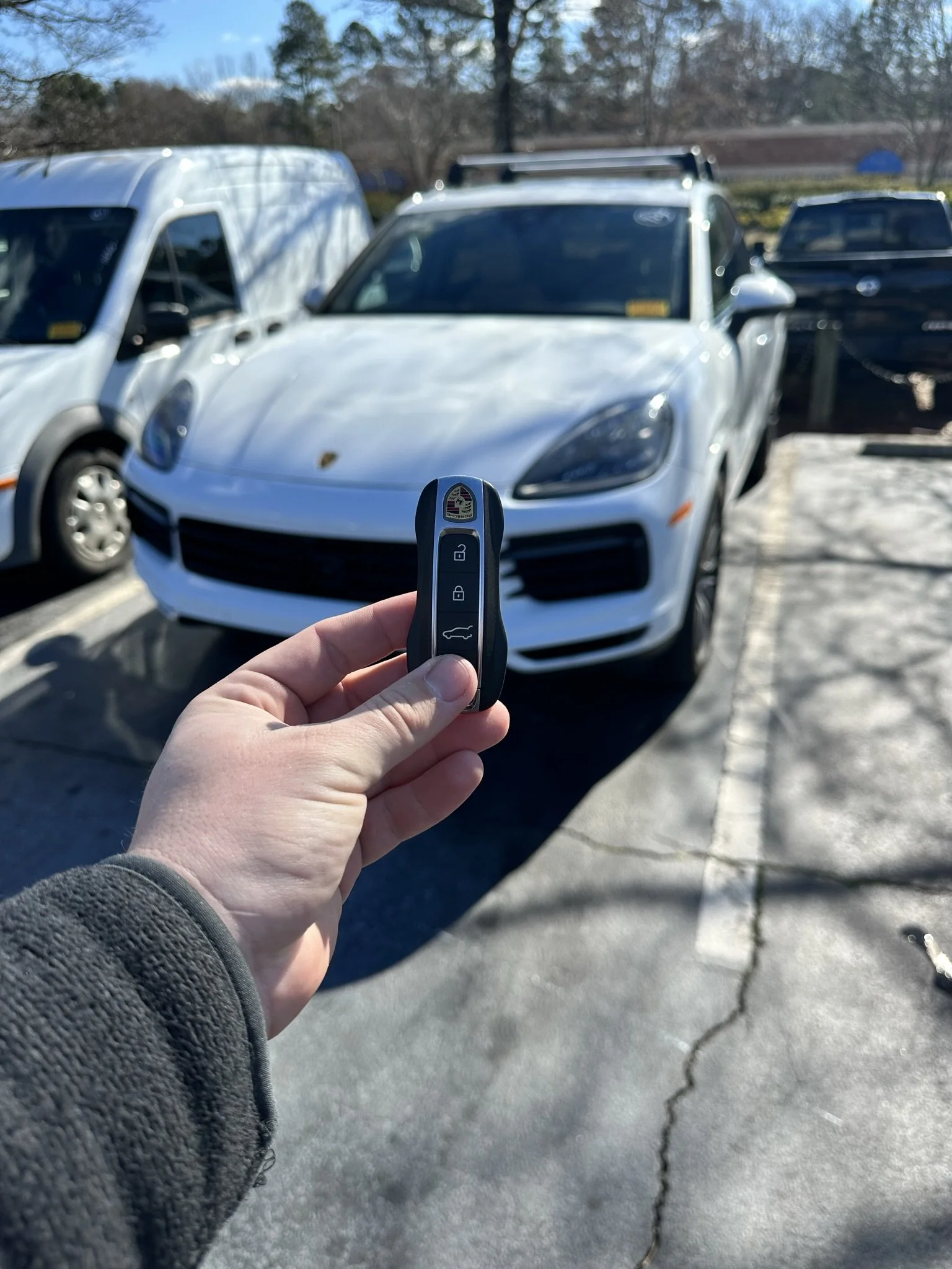 Locksmith programming a replacement car key fob in Raleigh NC