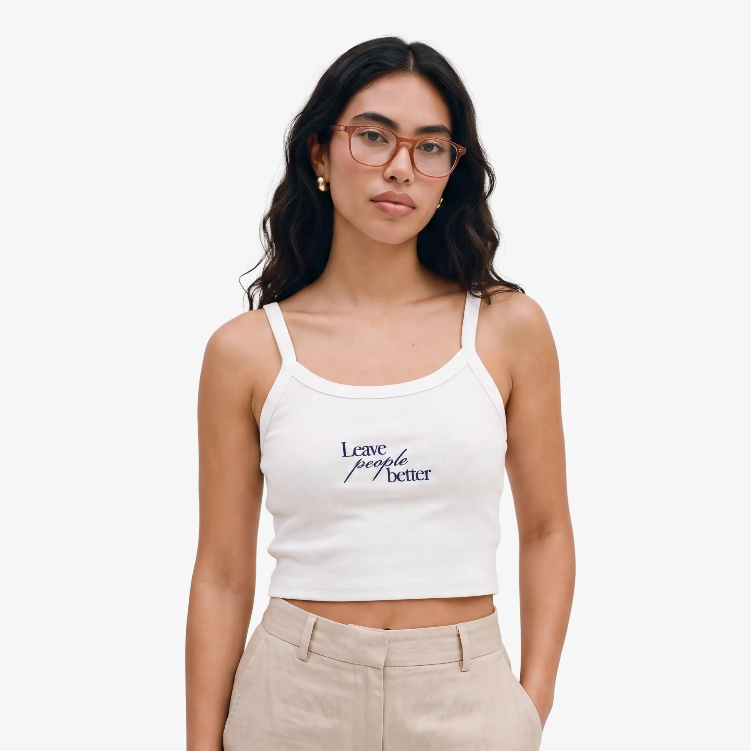 Model wearing the Fruit & Form Better Because You Were Here white tank top.