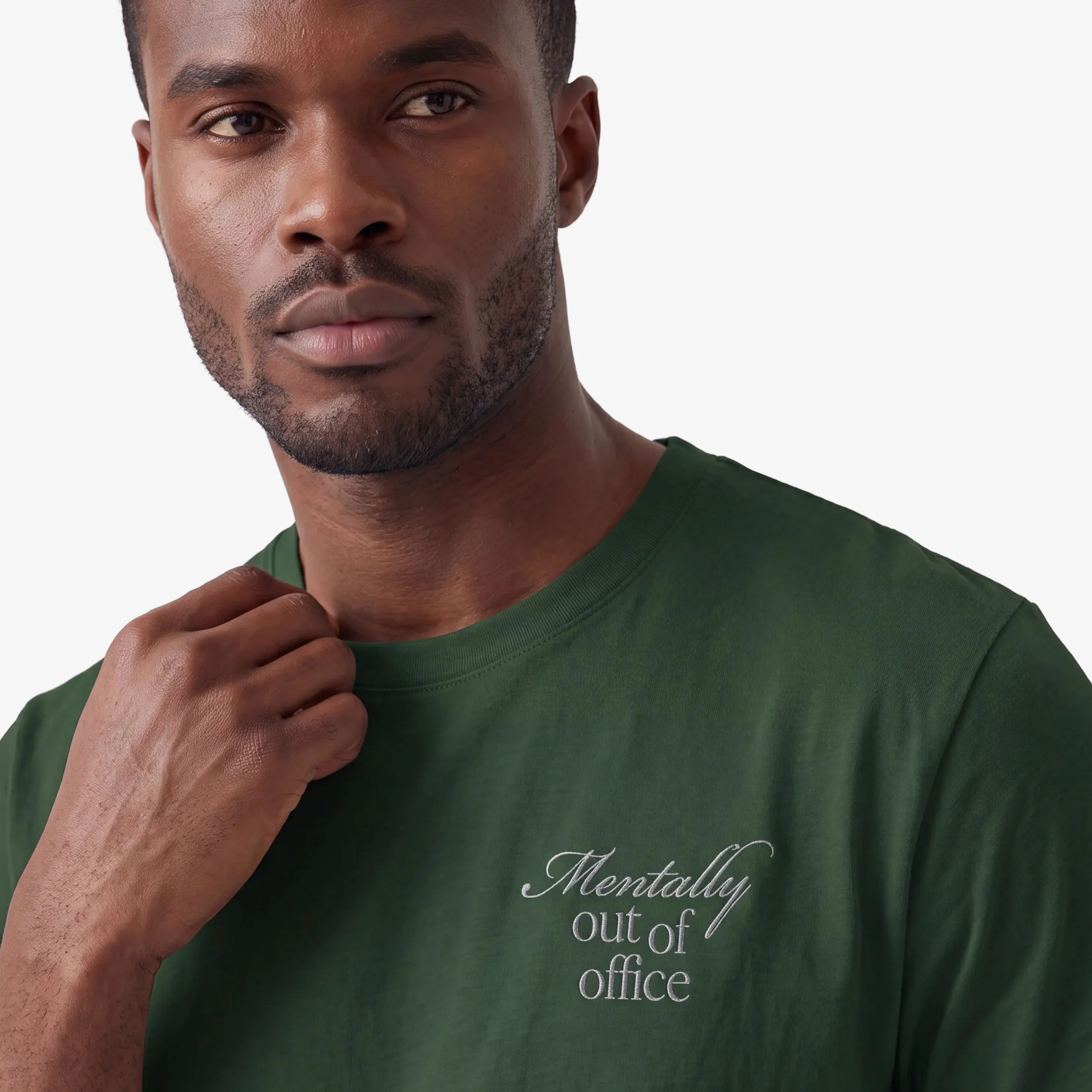 Model wearing the Fruit & Form Easy Does It green hoodie.
