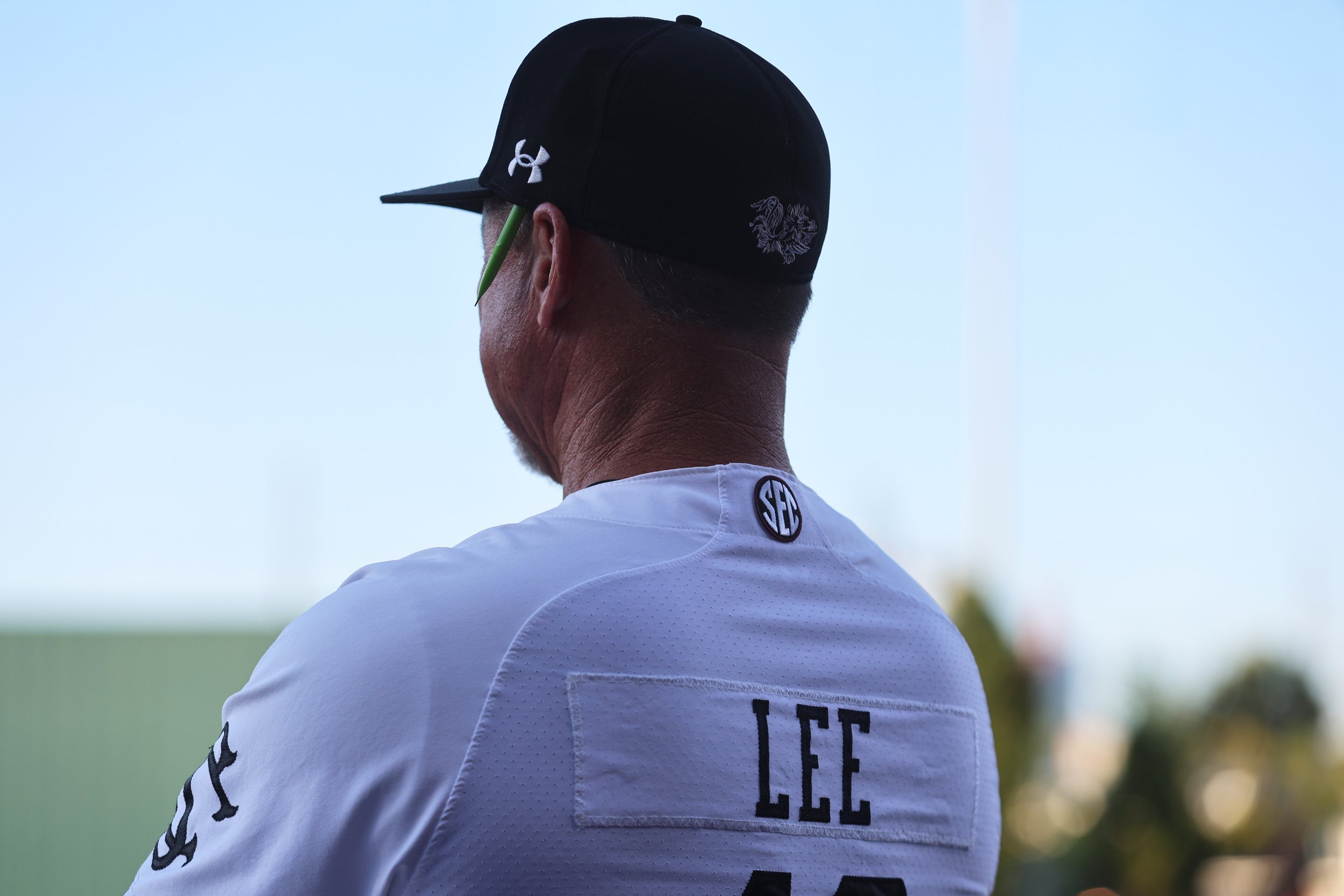 South Carolina interim head coach Monte Lee watches from the dugout. 