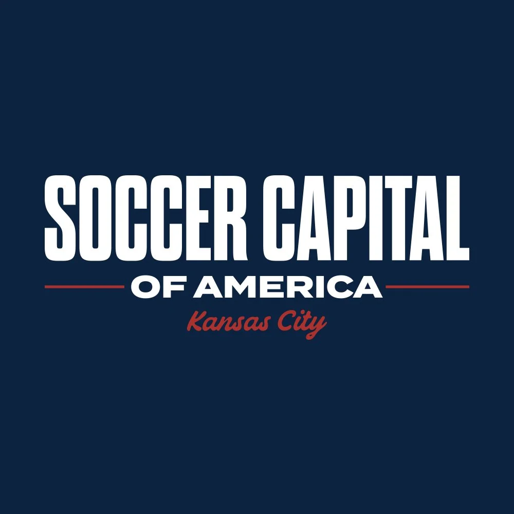 Logo for Soccer Capital of America, Kansas City, with white and red text on a dark blue background.