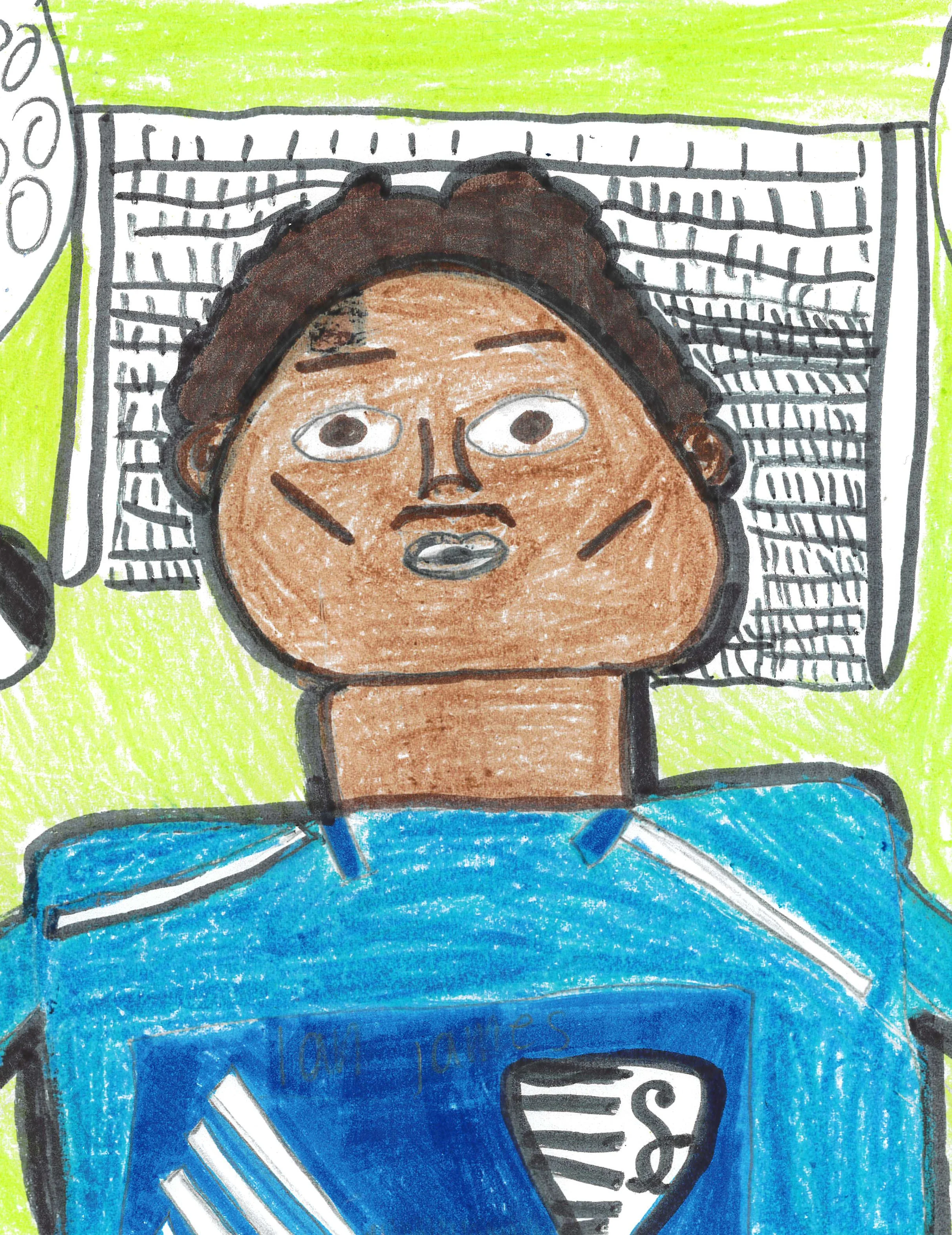 Child with brown skin and dark curly hair lying on a bed with green bedsheets, wearing a blue shirt with a sports logo, under a black and white striped blanket.