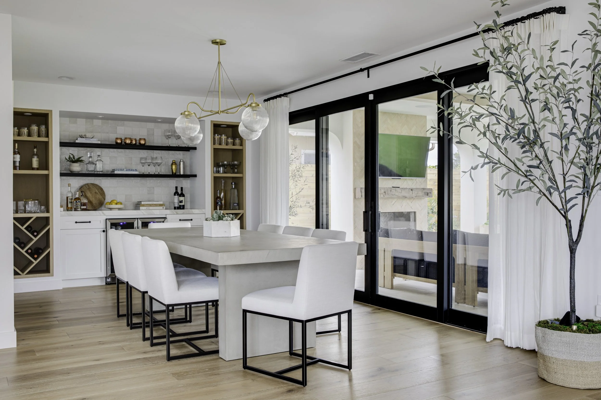 A Raised Floor That Connects Living, Dining, and Kitchen Spaces