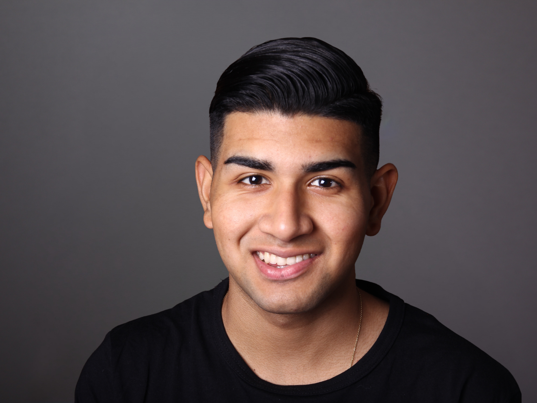 Smiling patient representing periodontal treatment and gum health services at Dental Care of Cerritos.