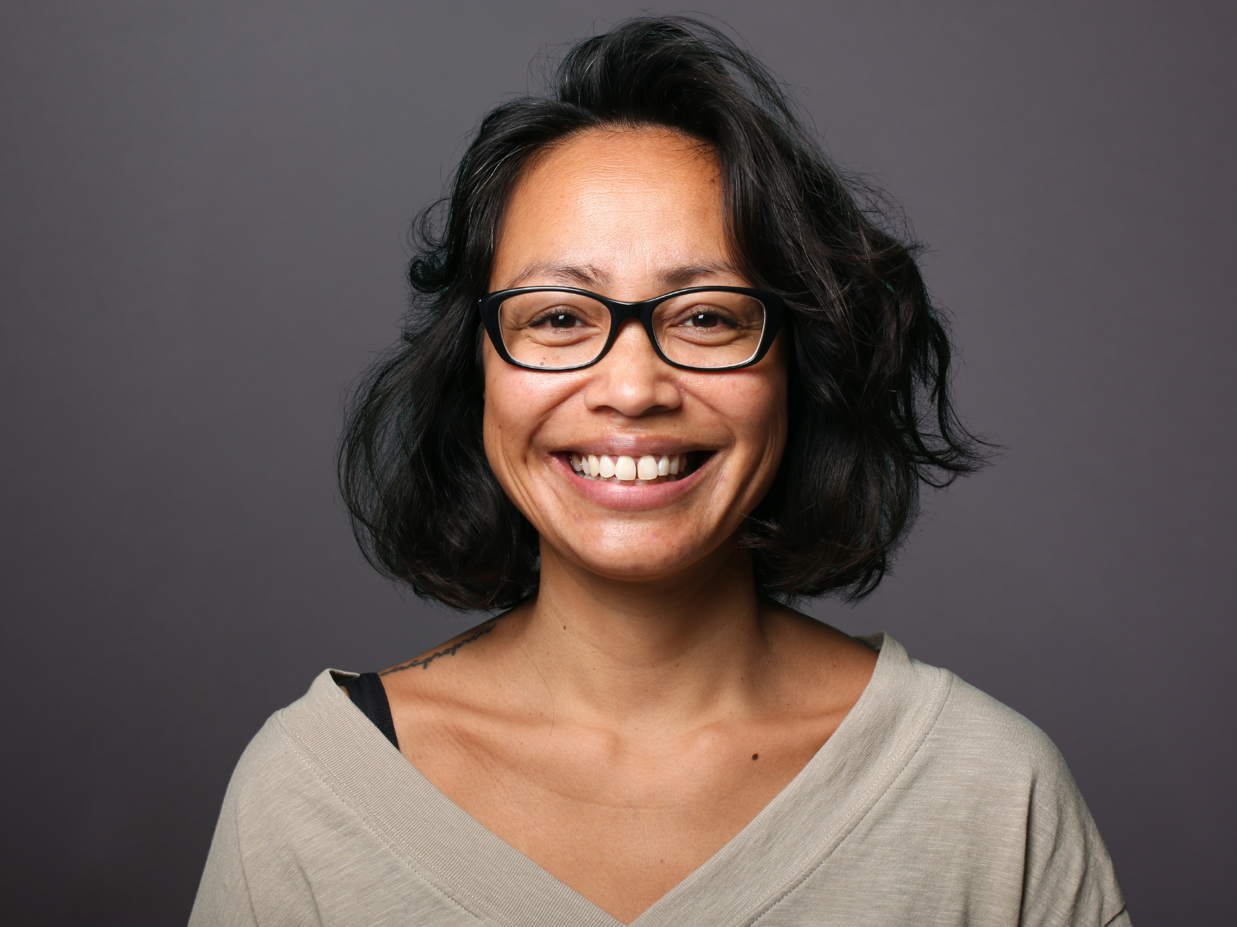 Smiling patient representing comfortable dental exams and cleanings at Dental Care of Cerritos for preventive oral health care.