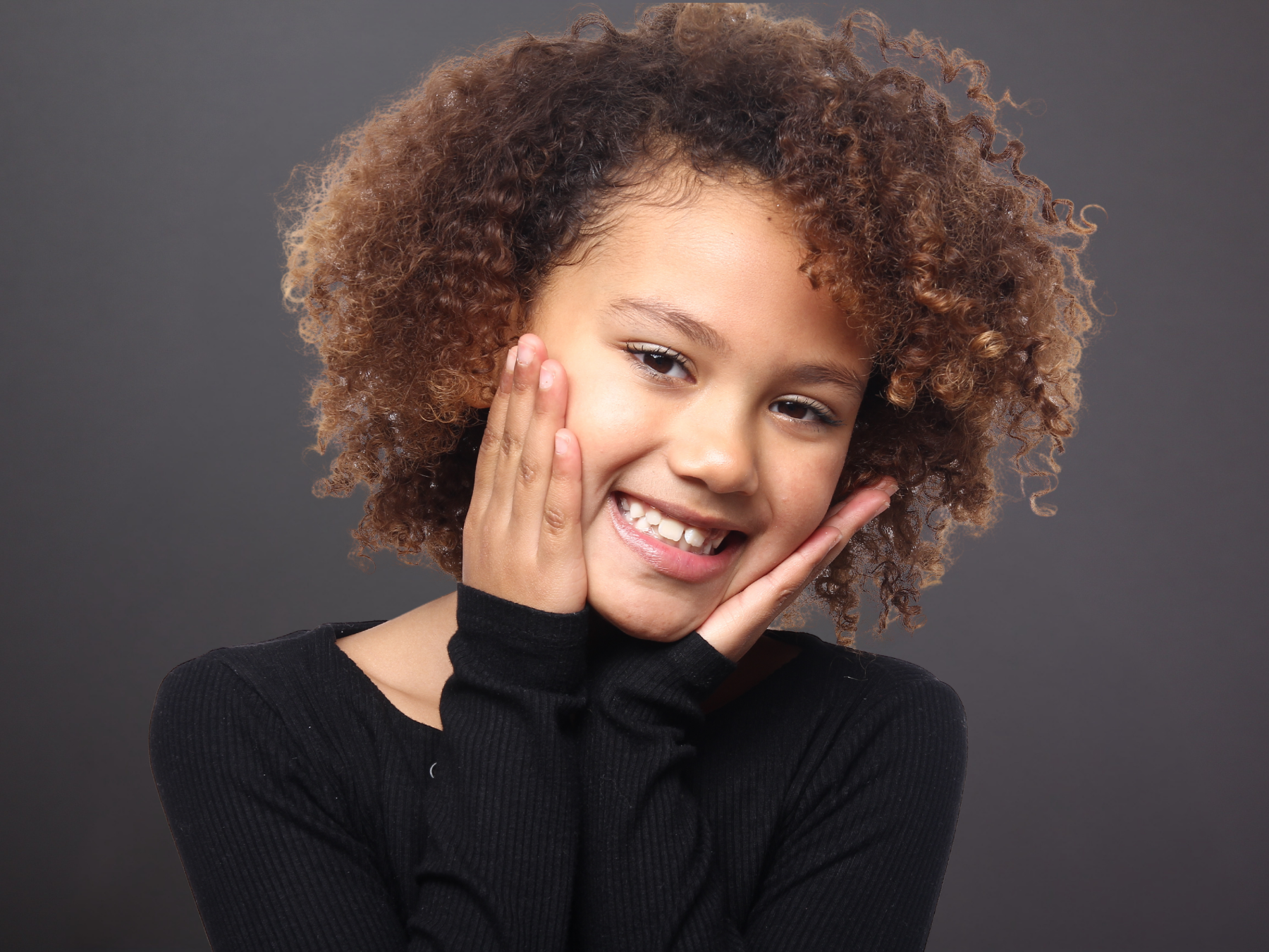 Smiling patient representing dental sealants that help protect back teeth and support long-term oral health at Dental Care of Cerritos.