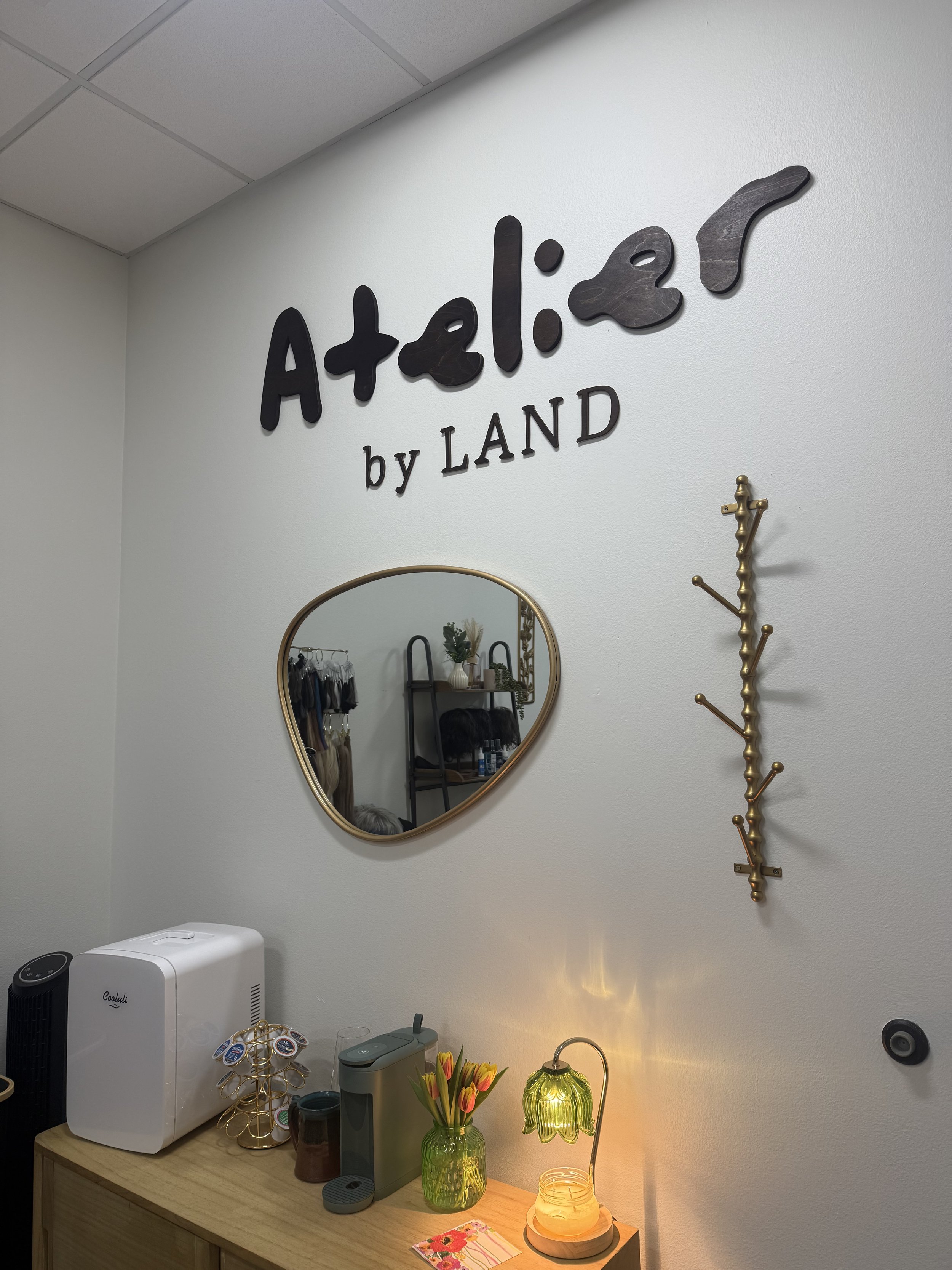 Atelier by Land LLC private hair studio located in Vestavia Hills Alabama specializing in mens hair systems, mesh integration, and hair extensions