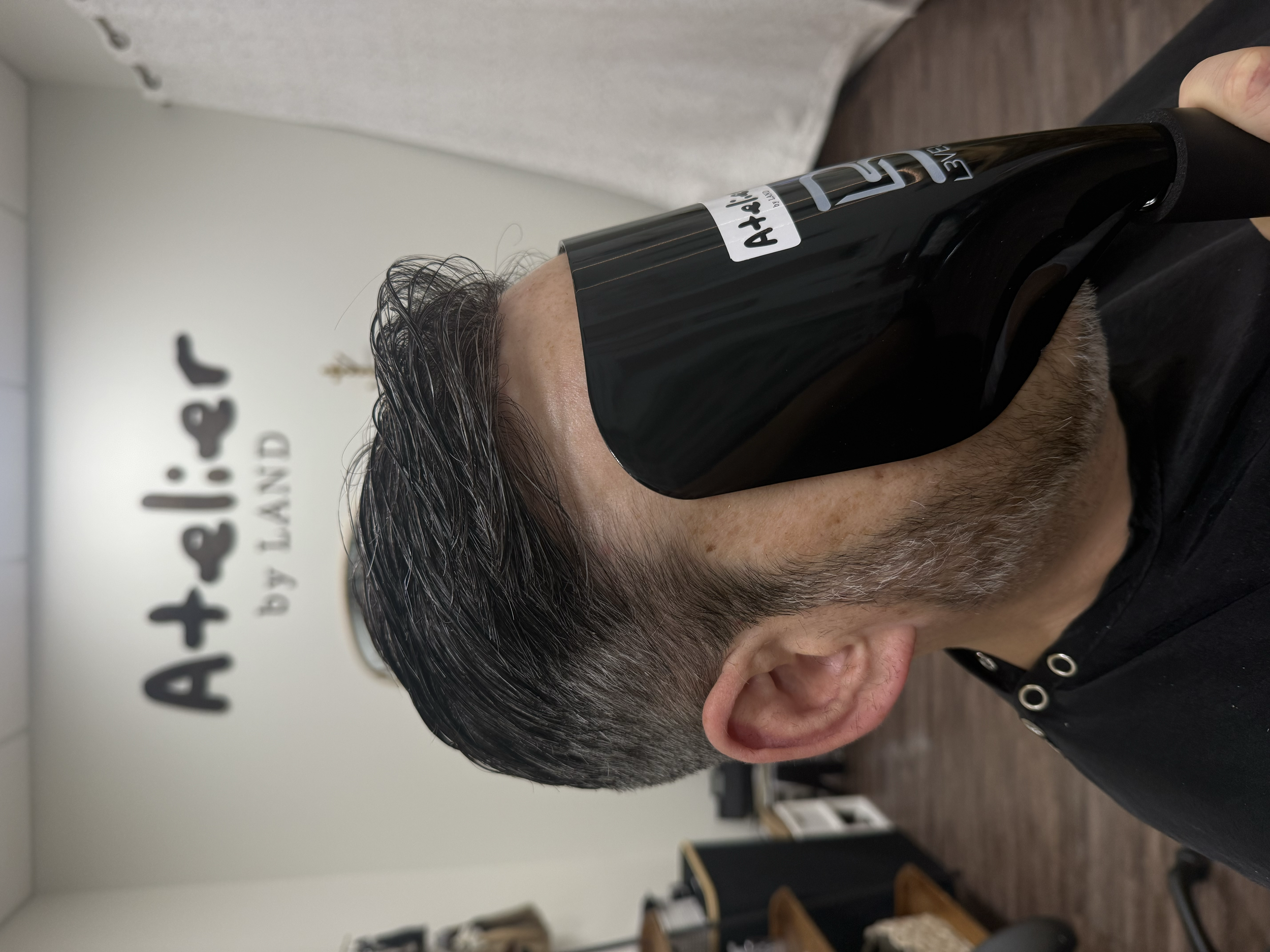 Custom men's hair system fitted at Atelier by Land private hair studio in Vestavia Hills, AL