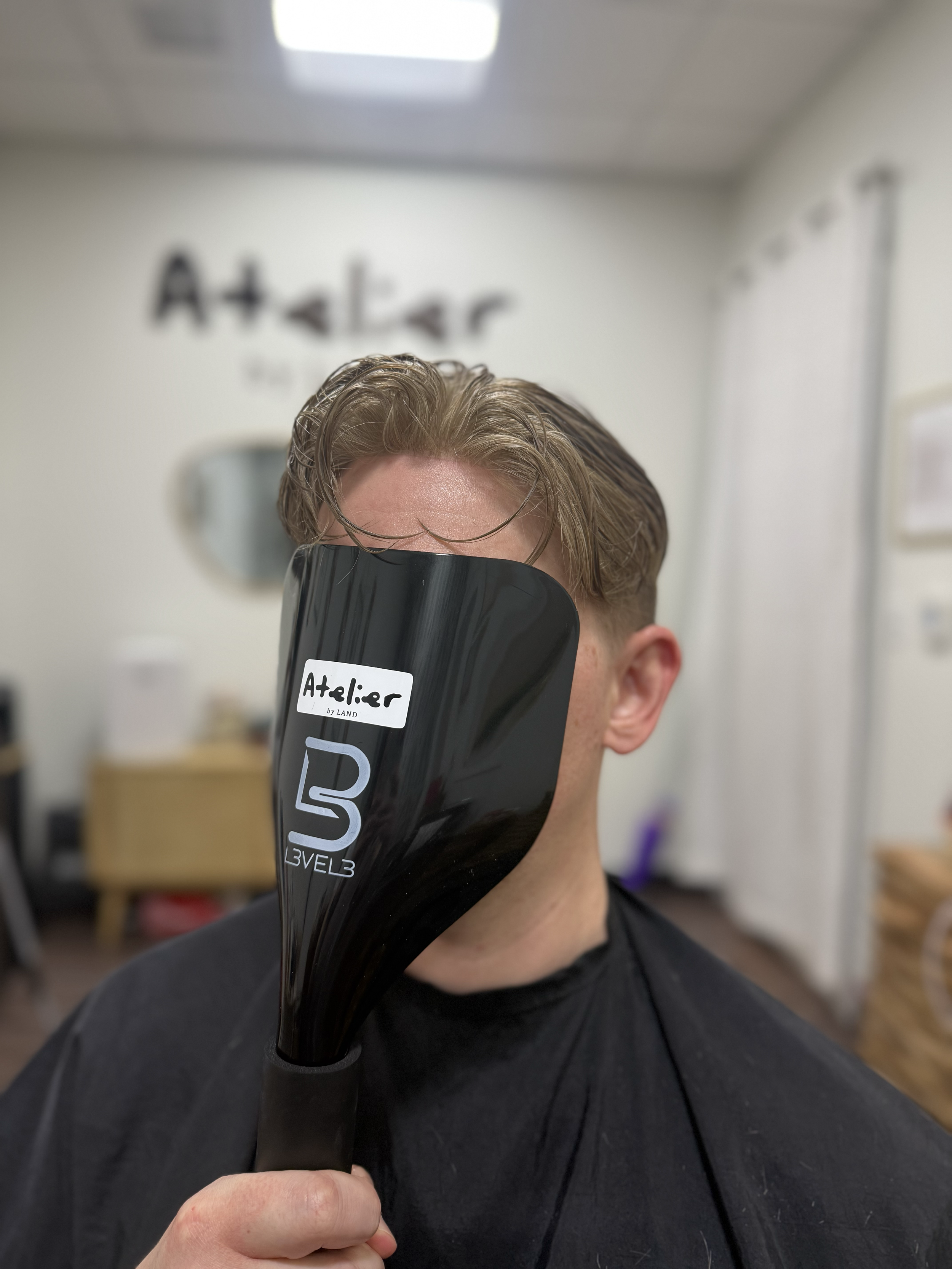 Discreet men's hair system installation — Atelier by Land hair studio serving Birmingham, Hoover and Vestavia Hills Alabama.