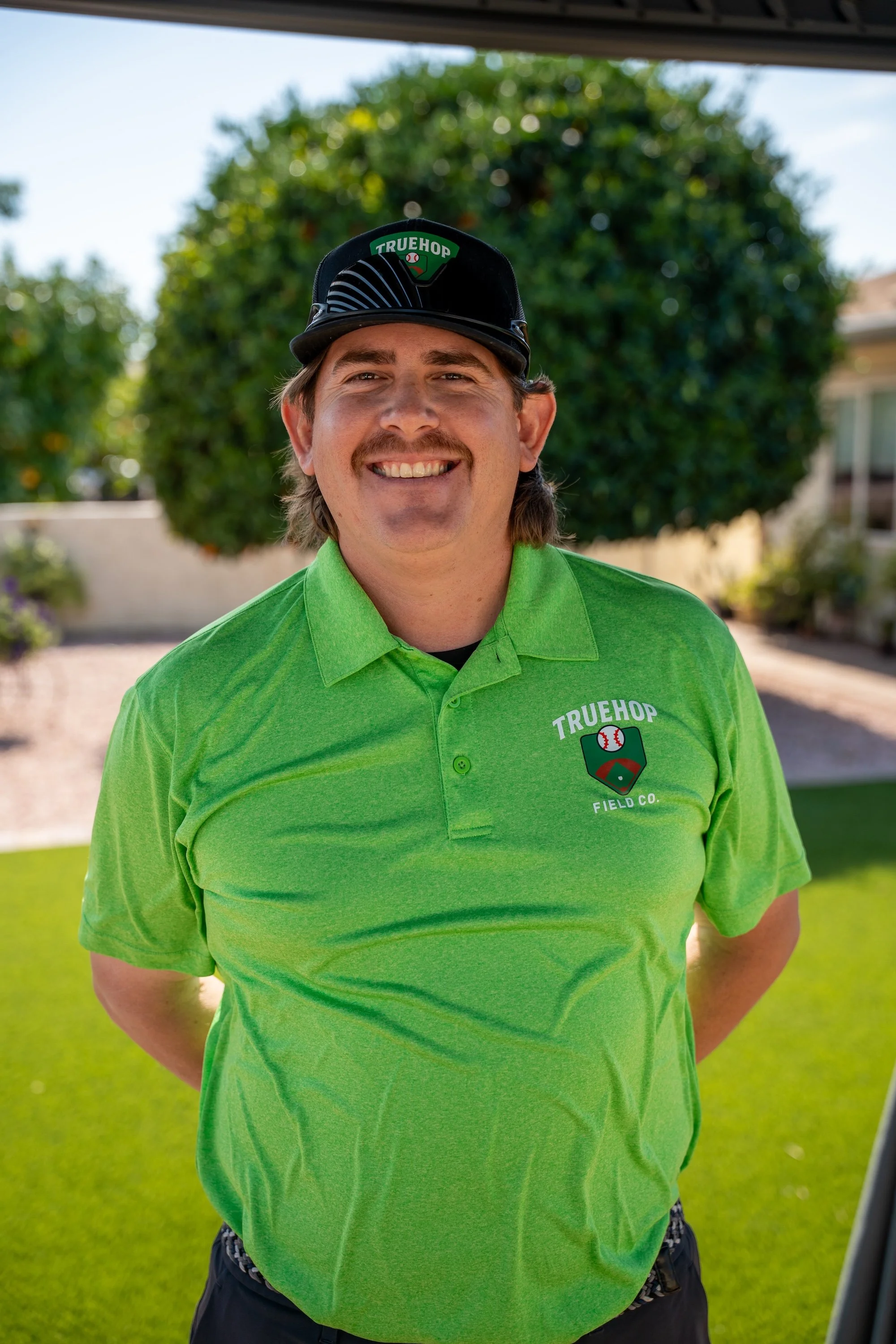 Headshot of Carlos Guzman, Operations Manager of True Hopfield Co, an Arizona sports field & court construction company.