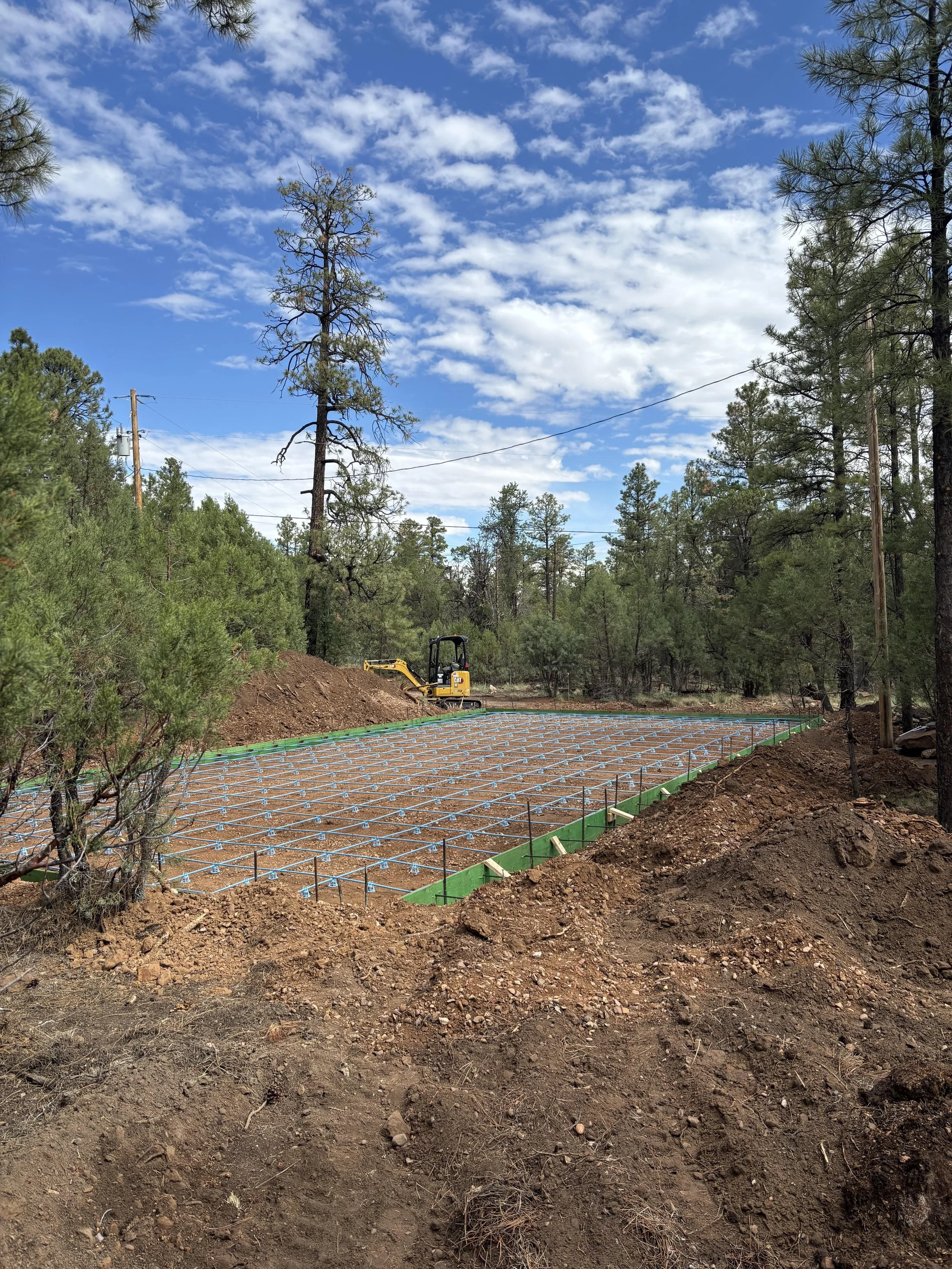 True Hop Field Co, Arizona sports field & court construction, team members working on a post tension sport court.