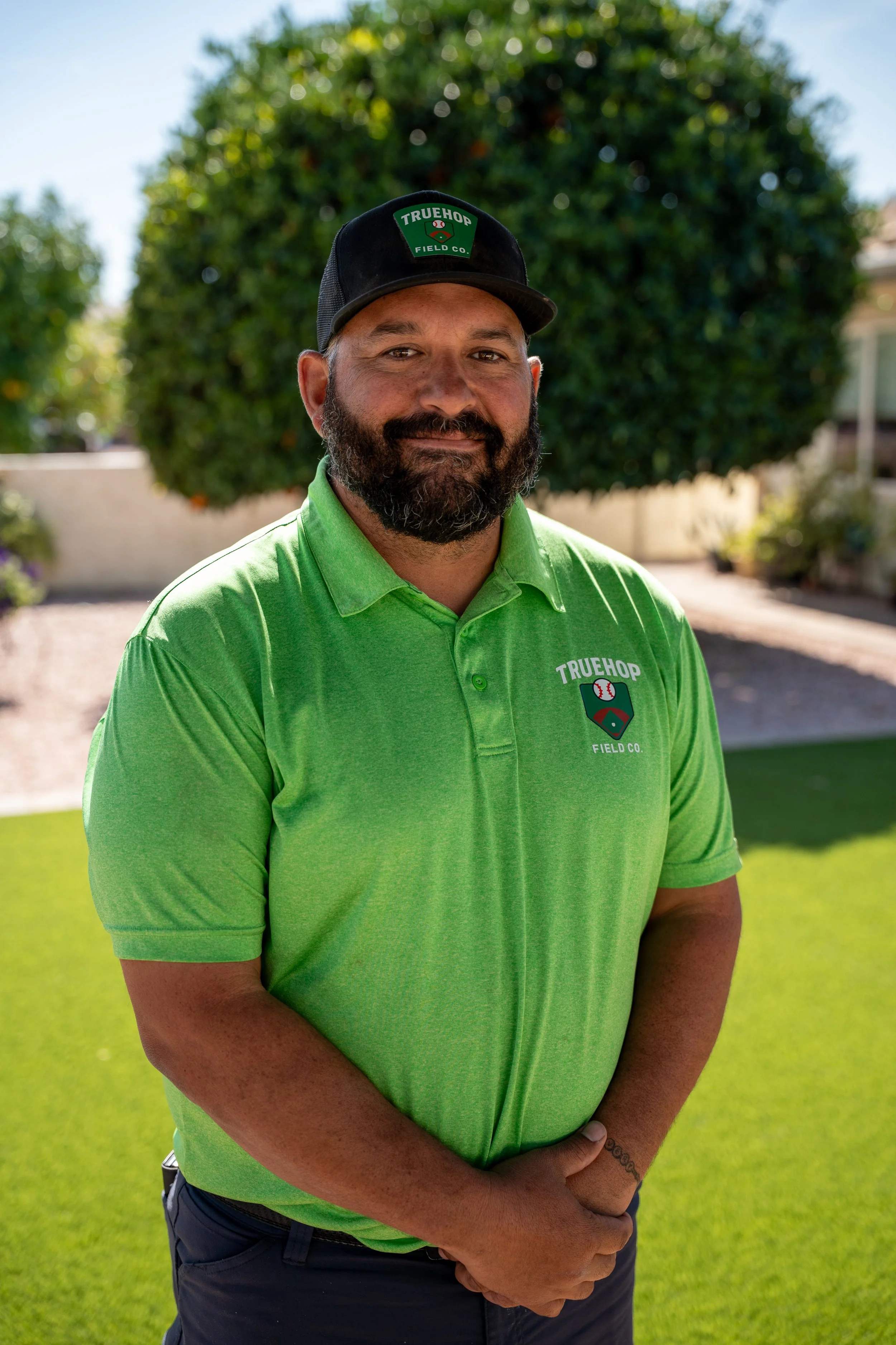 Headshot of CR Salisbury, CEO of True Hopfield Co, an Arizona sports field & court construction company.