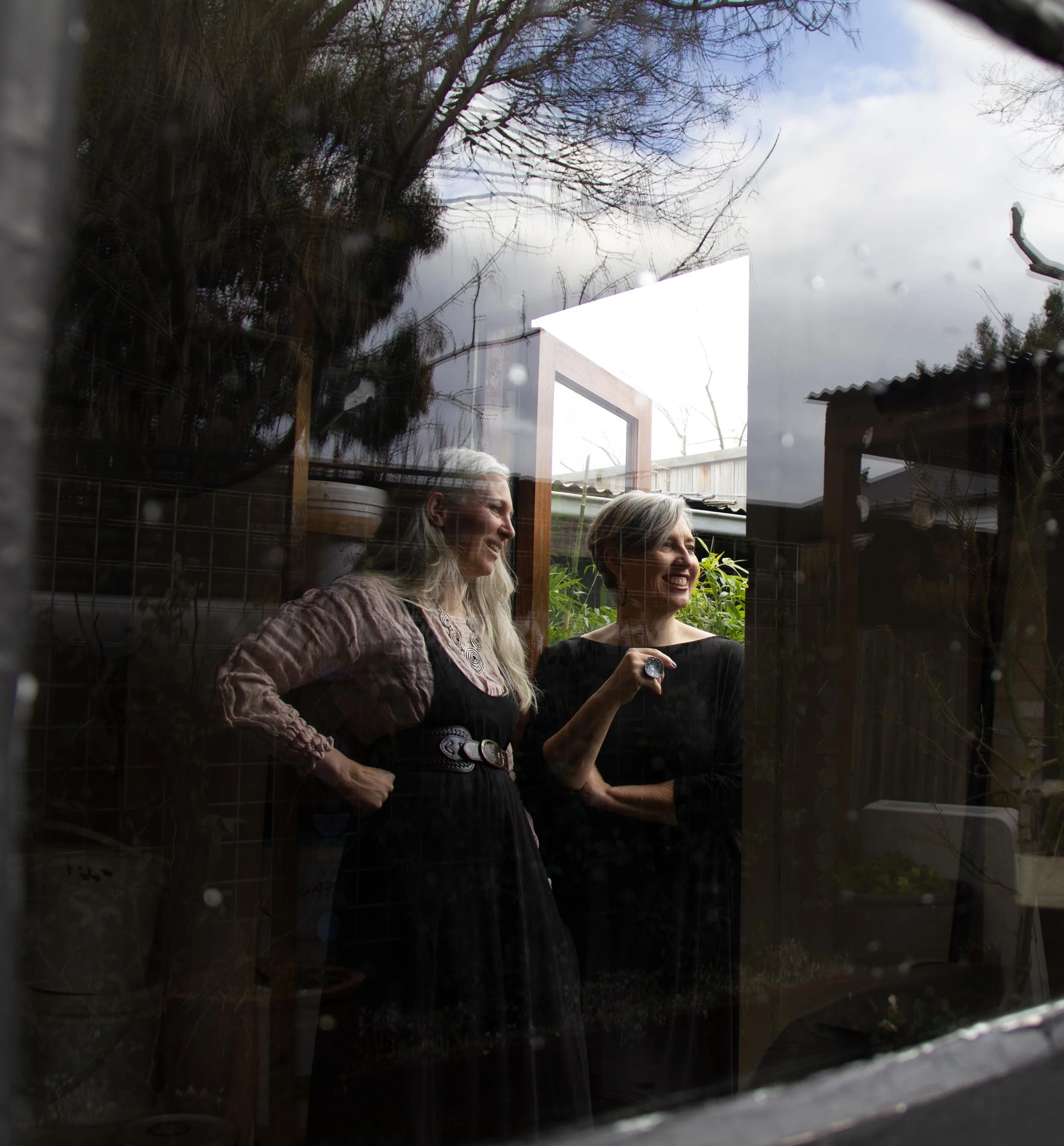 the two makers of Kindred Lantern gazing out of studio space