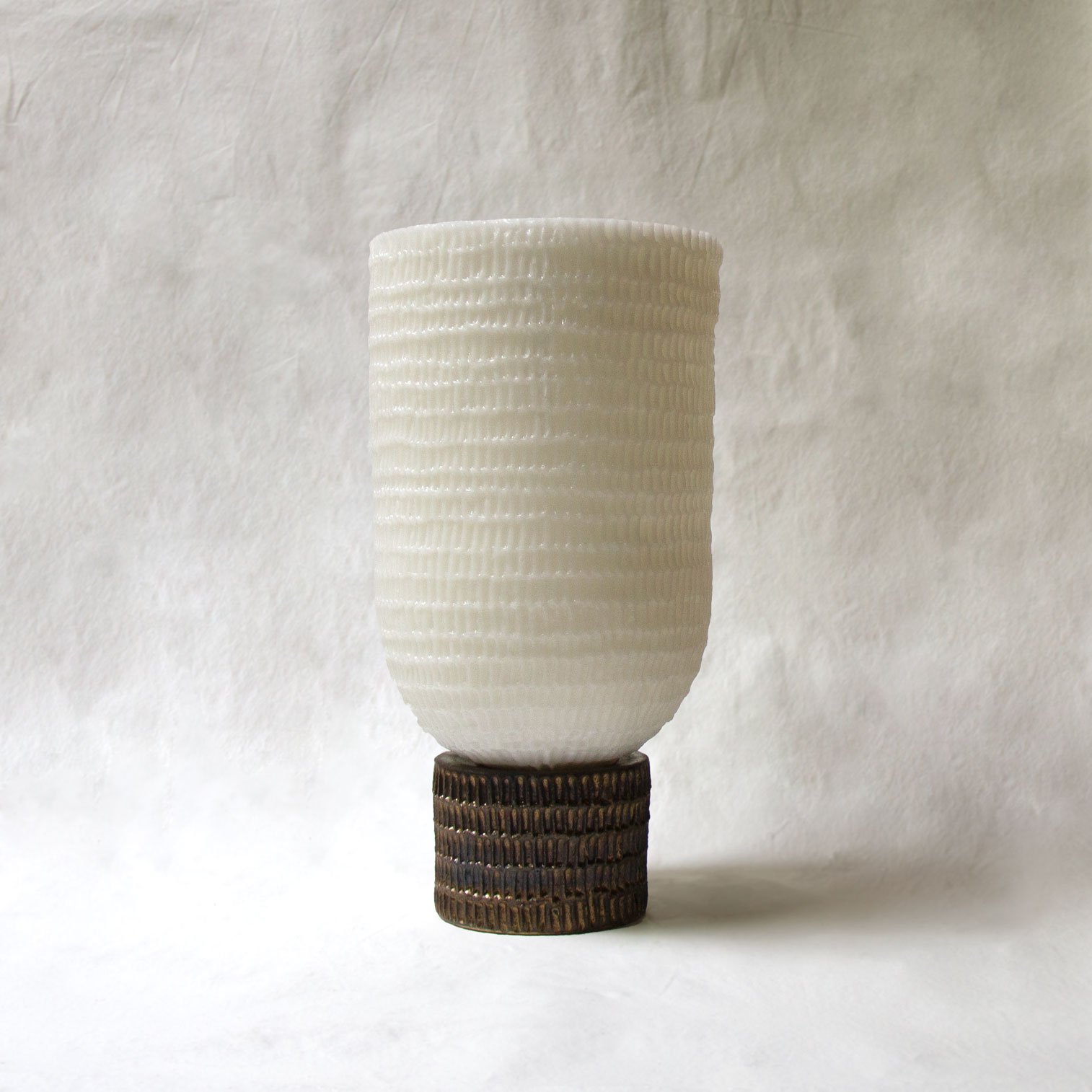 Bespoke Wax lantern with aged bronze glaze on ceramic base and etched pattern on wax shade