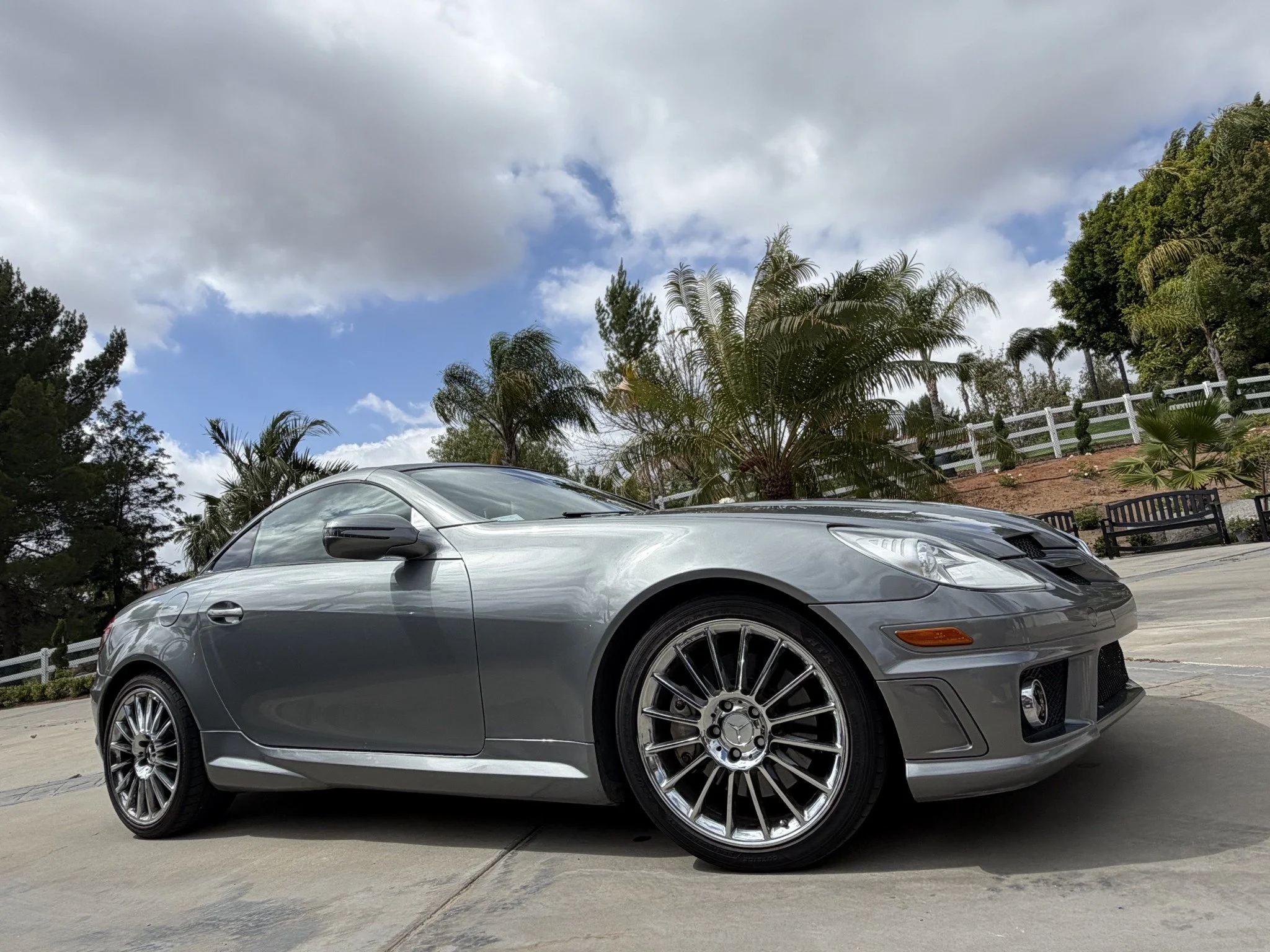 Silver Mercedes-Benz SLK with polished AMG wheels after a mobile detail in Poway, CA