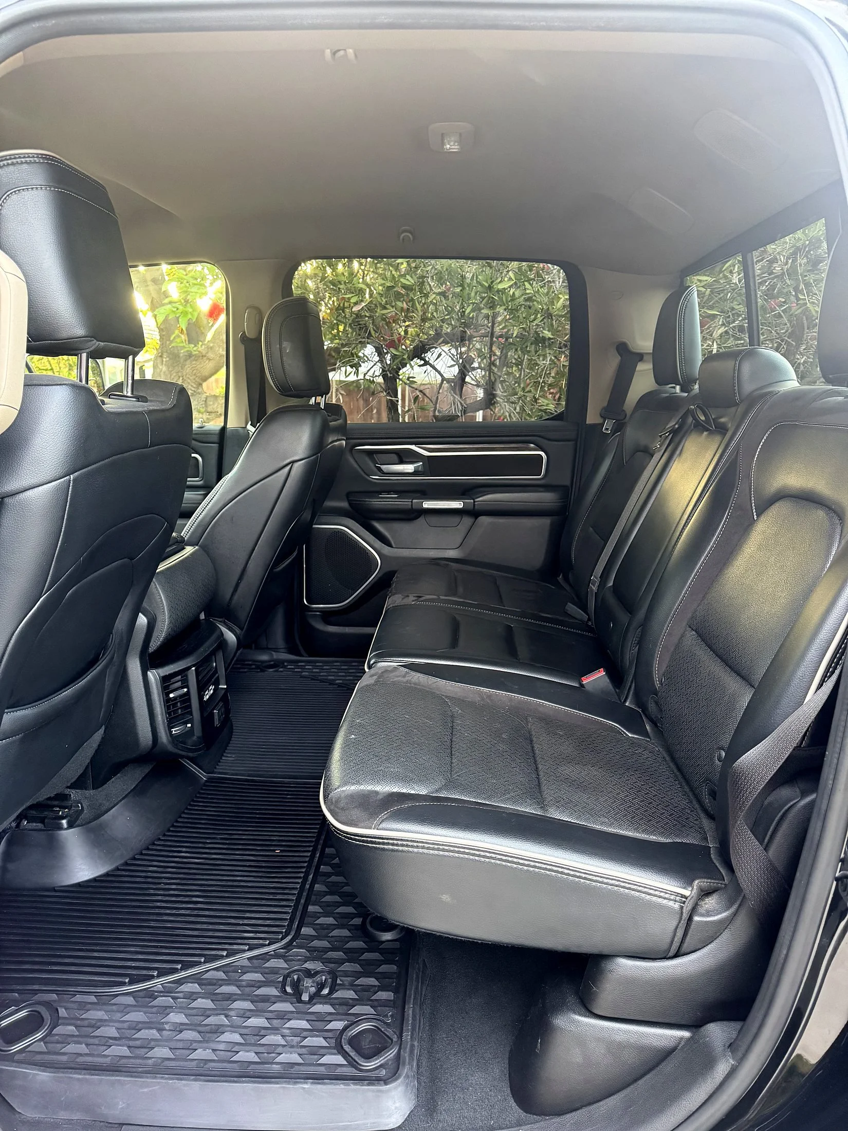 Ram truck rear leather seats and floor mats after an interior detail