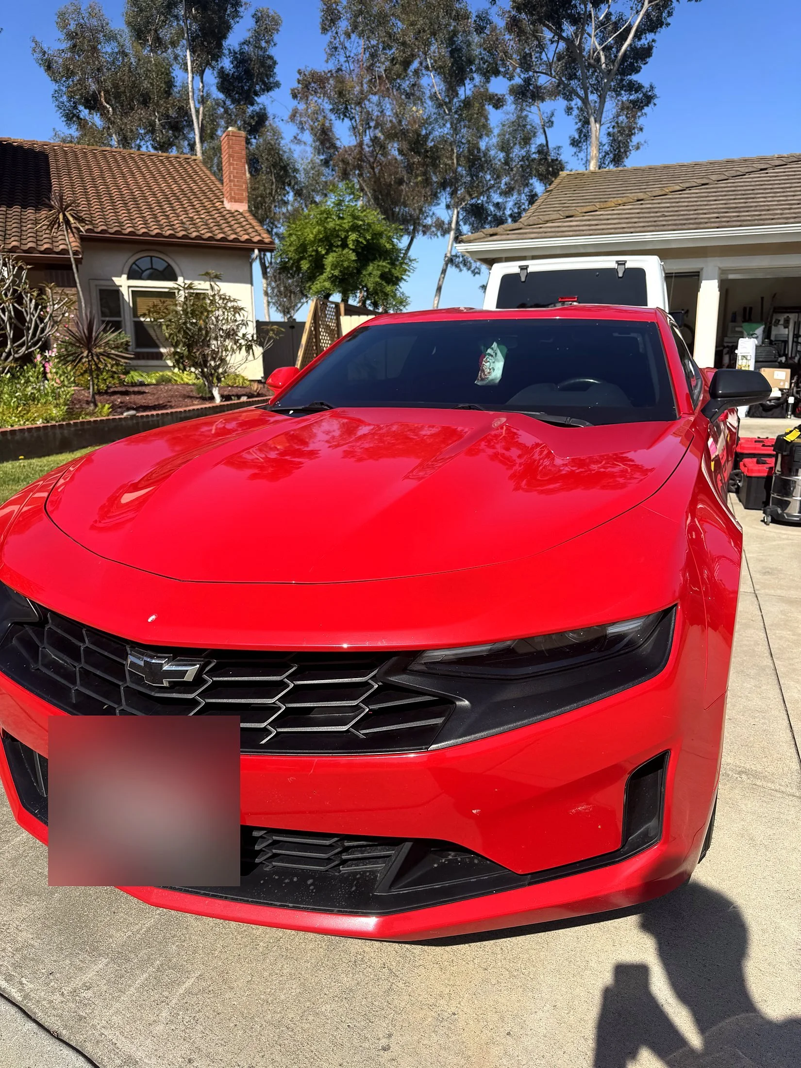Red Chevy Camaro after a mobile exterior detail