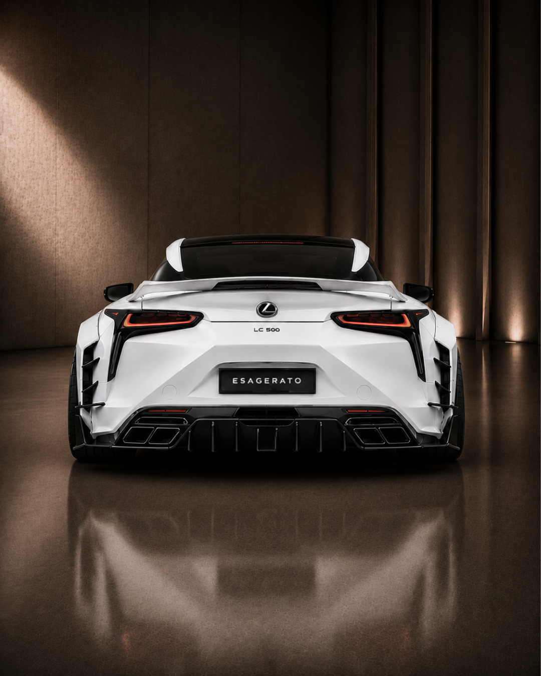 Rear view of a white Lexus LC 500 Esagerato sports car in a dimly lit showroom.