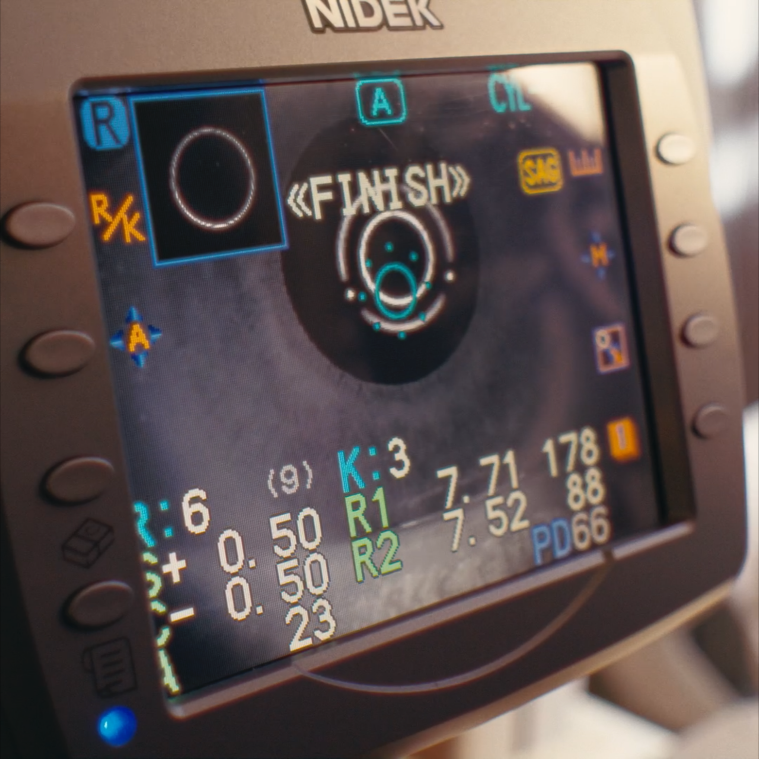 Close-up of an avionics display screen showing flight data, navigation information, and various control settings.
