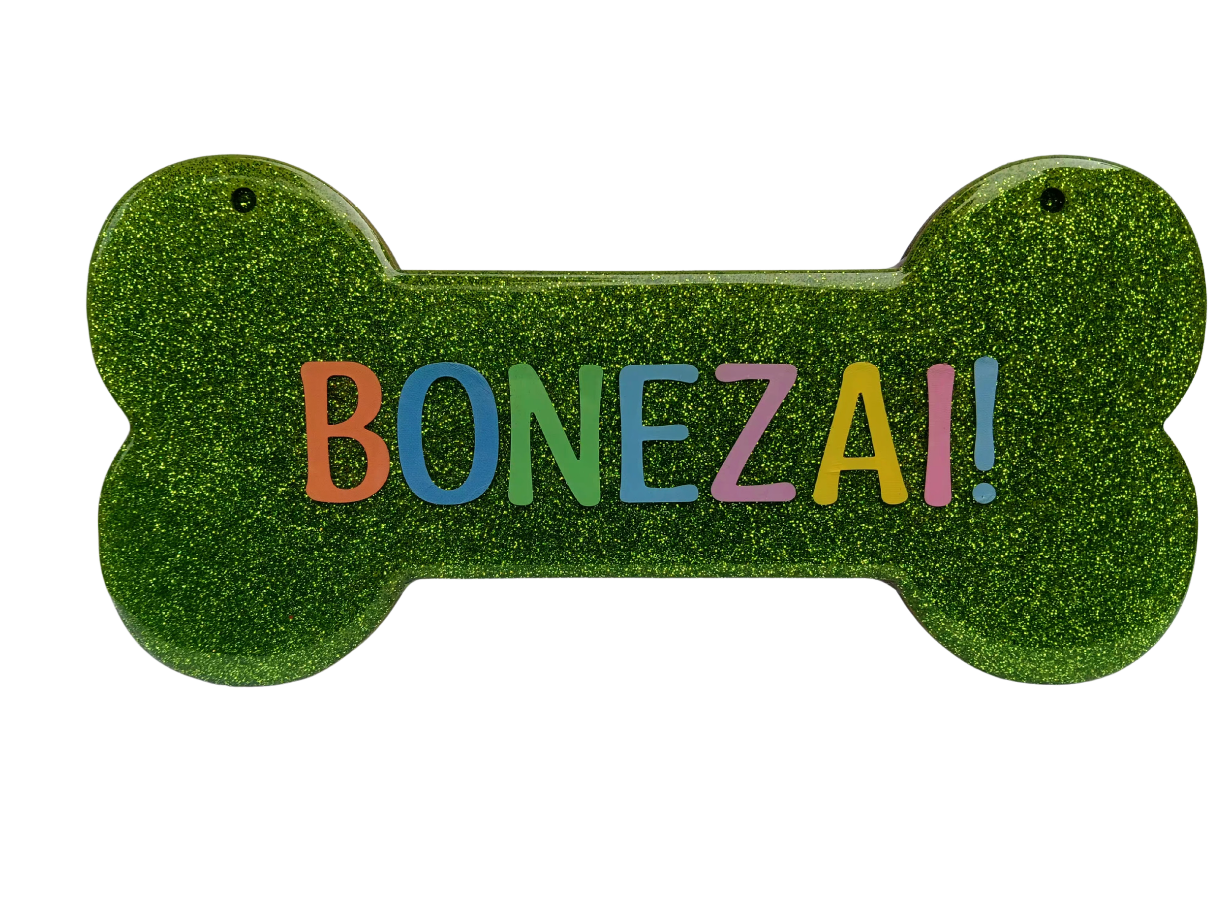 Colorful sign with large green glittery shapes and the word "BONEZAI!" in multicolored letters.