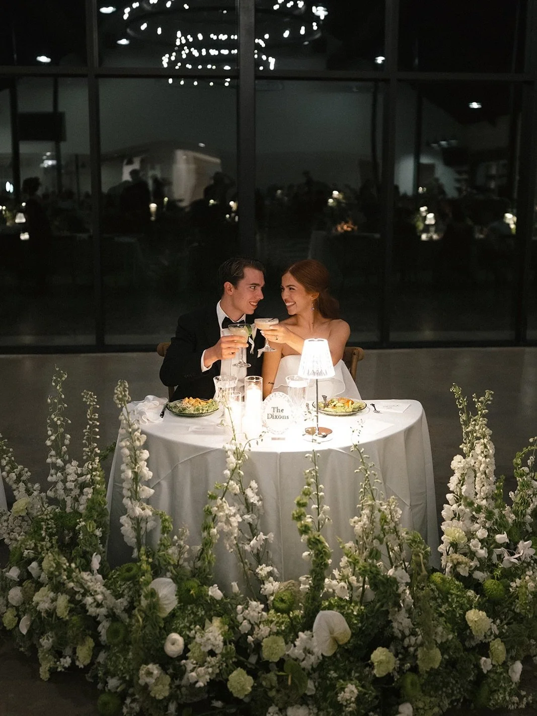 The sweetheart table of my dreams!!! Lush full pieces embracing the curve of the first table they&rsquo;ll sit at as husband &amp; wife. Rich greens, patterns and lamp light made for an organically grounded reception, reminiscent of an upscale jazz l