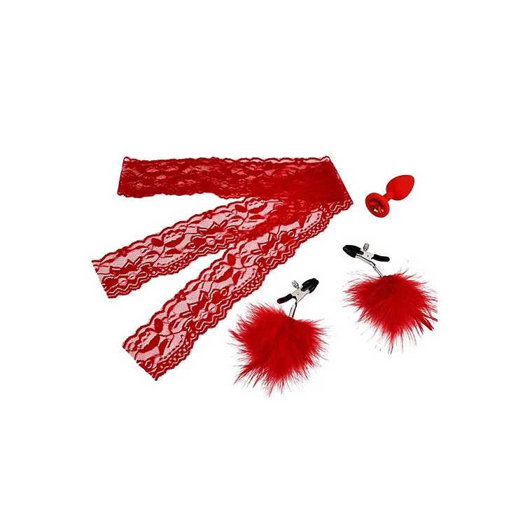 Red lace collar, red feather earrings, red bulb-shaped object, and a small red pushpin on a white background.