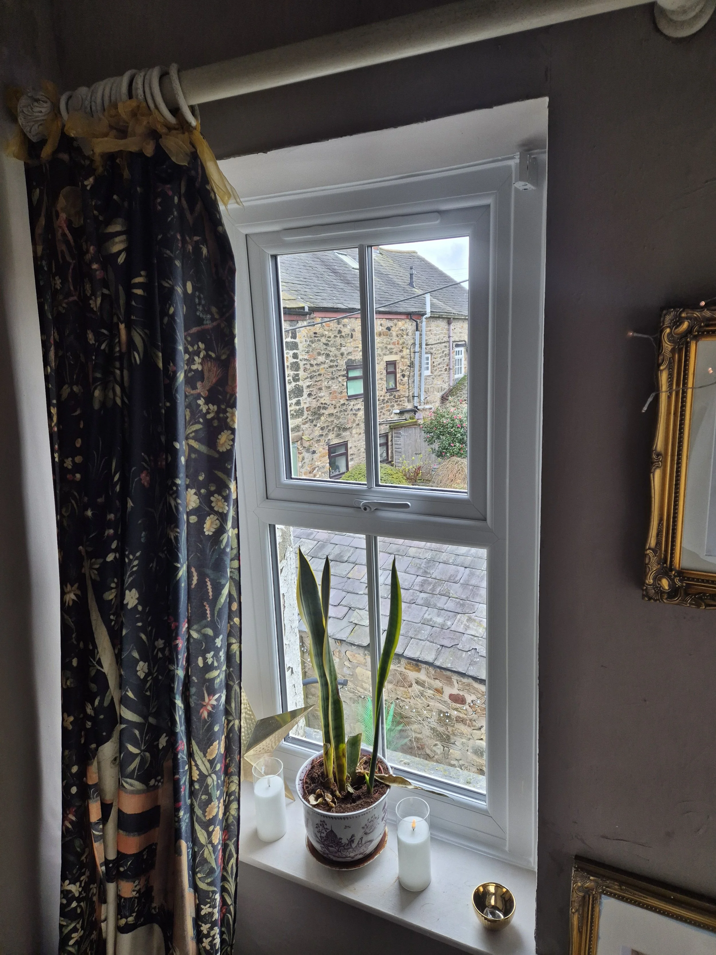 White PVC window with  astragal bars.