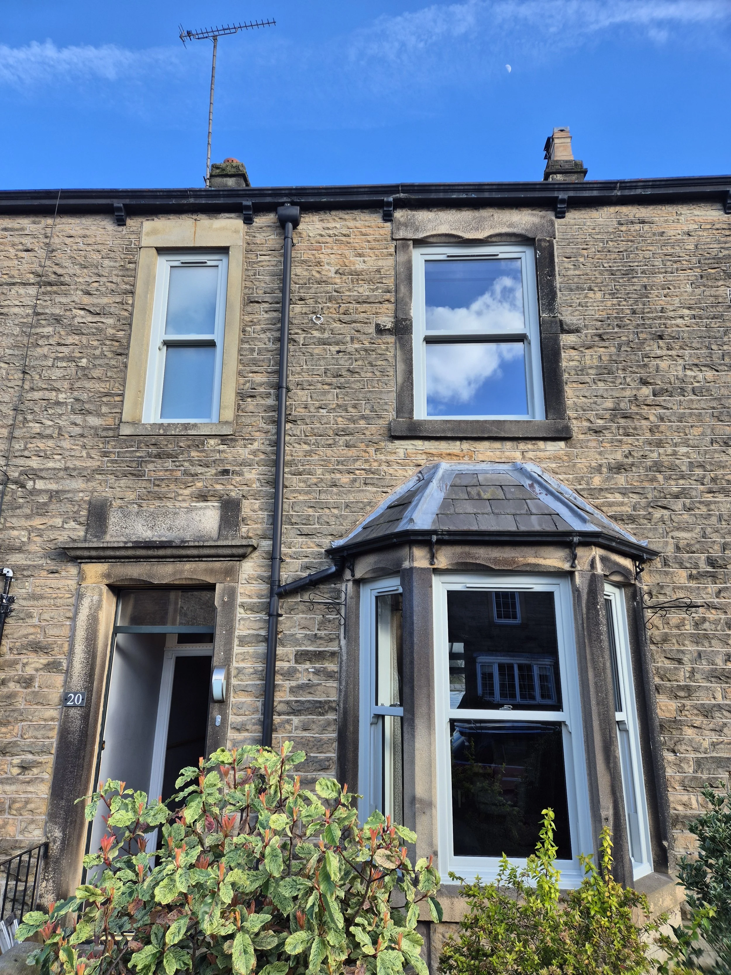 Full house Agate Grey PVC sliding sash windows installed to complete a period property transformation. This subtle, modern heritage colour blends beautifully with traditional architecture.
