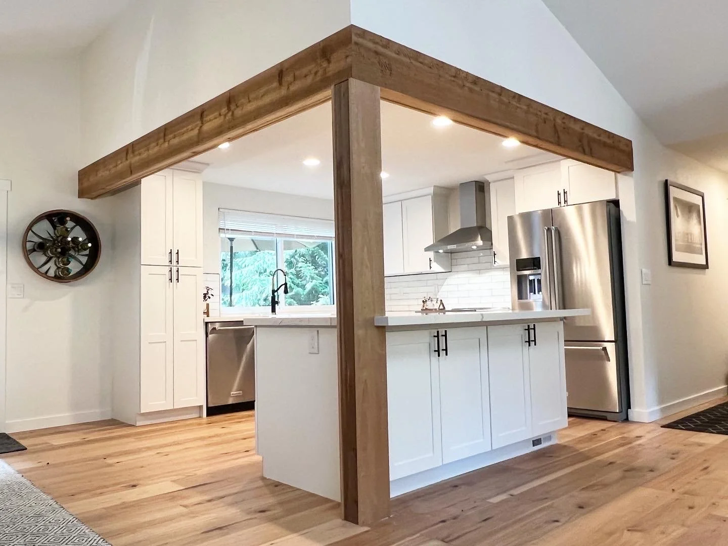 Stunning Sammamish kitchen remodel that lead to a full home remodel including laundry room, three bathrooms, a kitchen, adding a room, and all the flooring, doors, trim, paint, etc. throughout the house. 