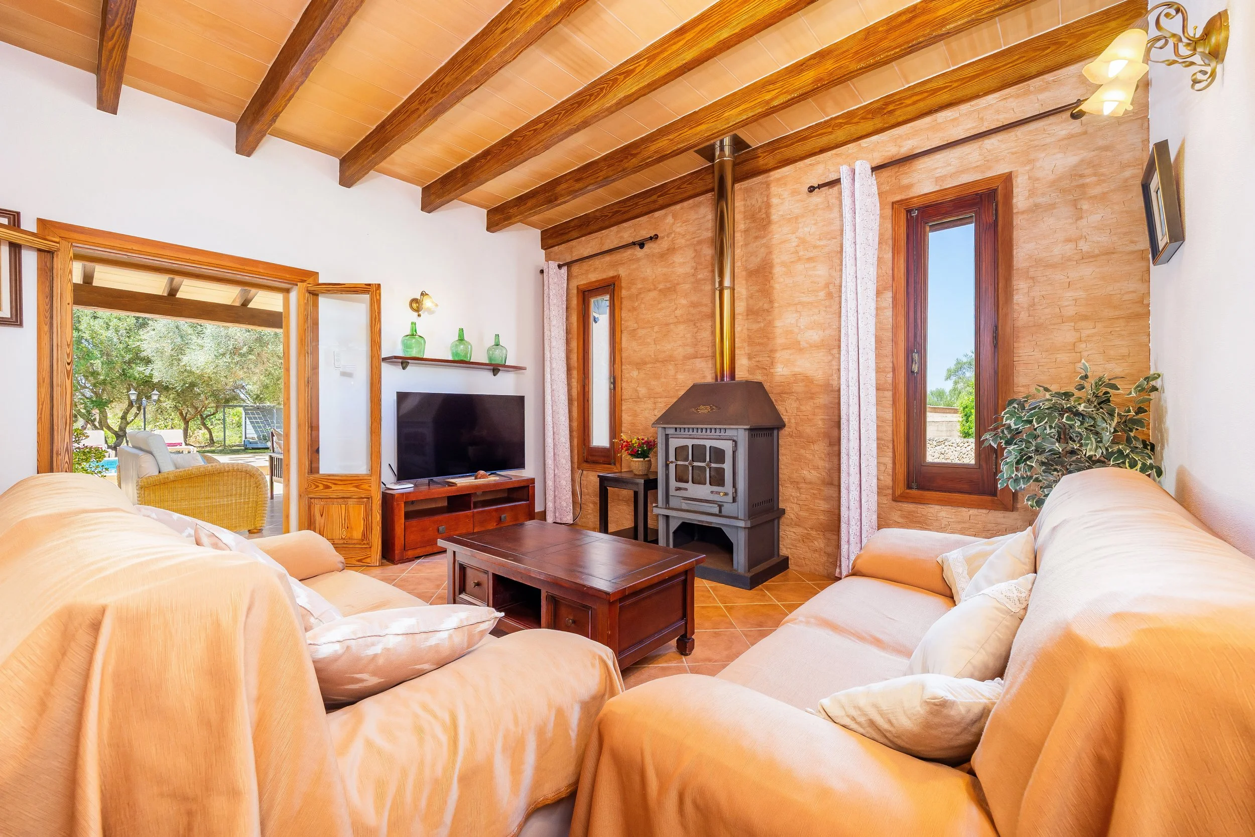 Traditional Mallorcan interior at Can Churi with rustic details and natural light real estate photography