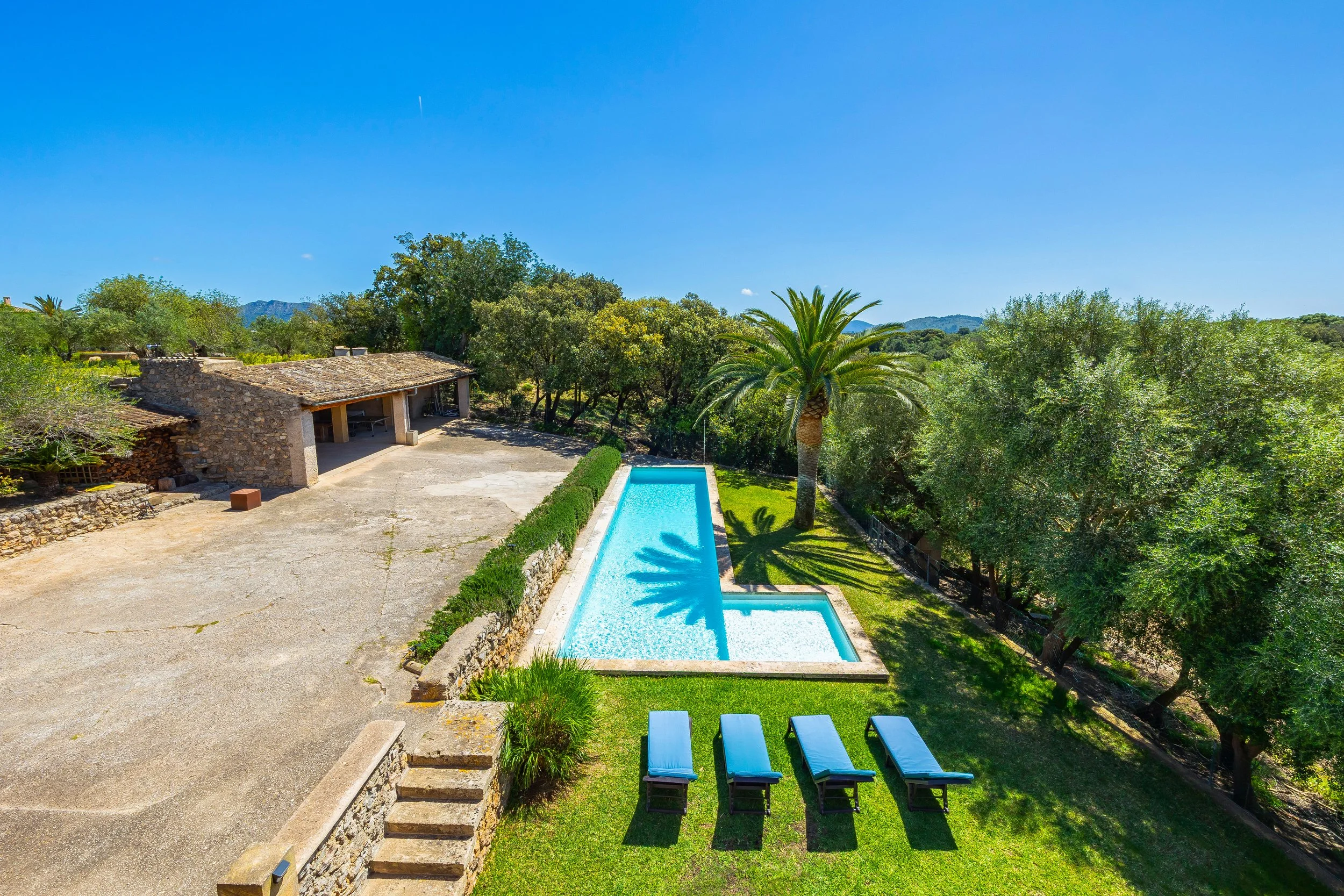 Traditional Mallorcan house with swimming pool near Artà surrounded by countryside real estate photography