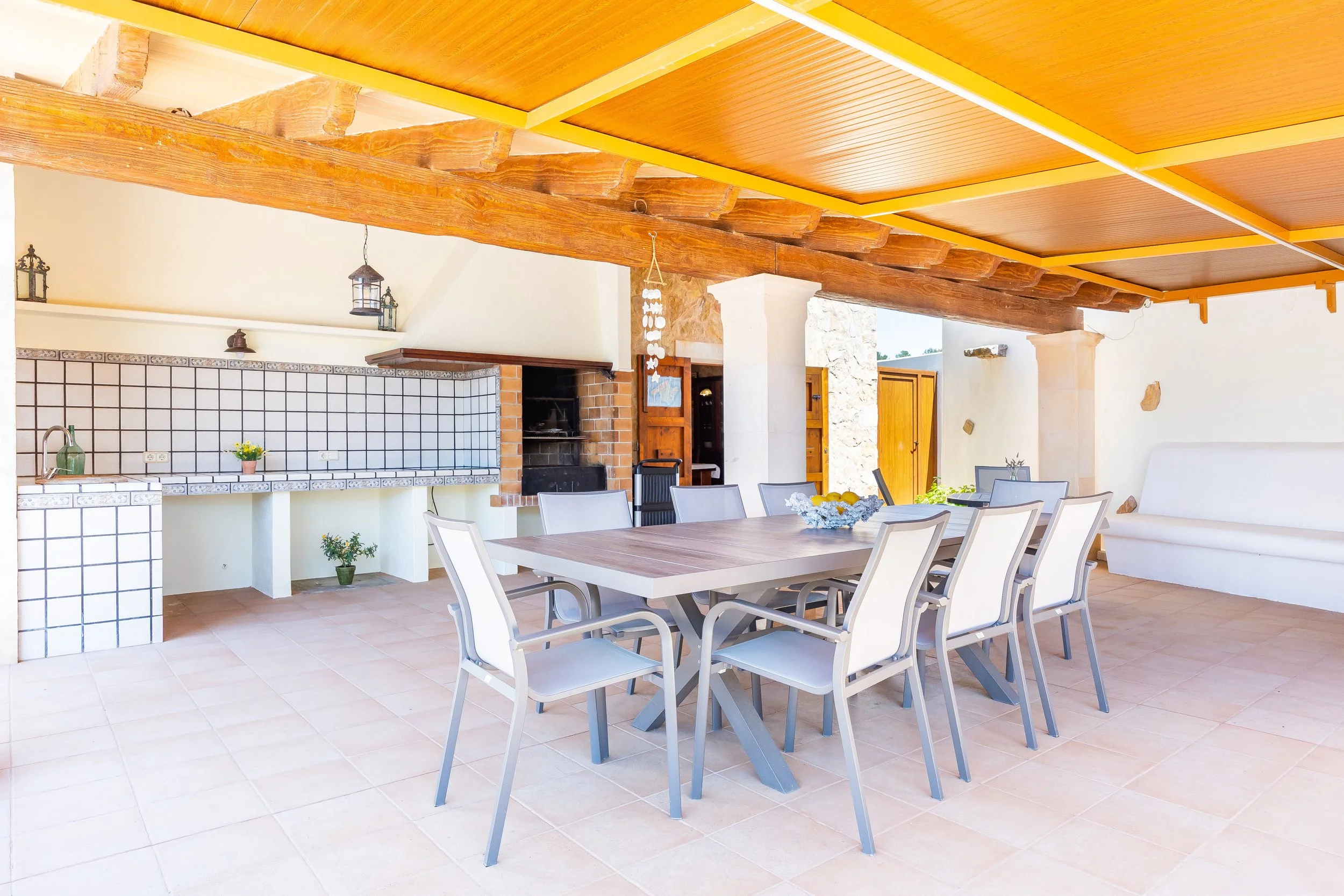 Traditional interior of Cas Cuni Mallorca with rustic architecture and natural light real estate photography