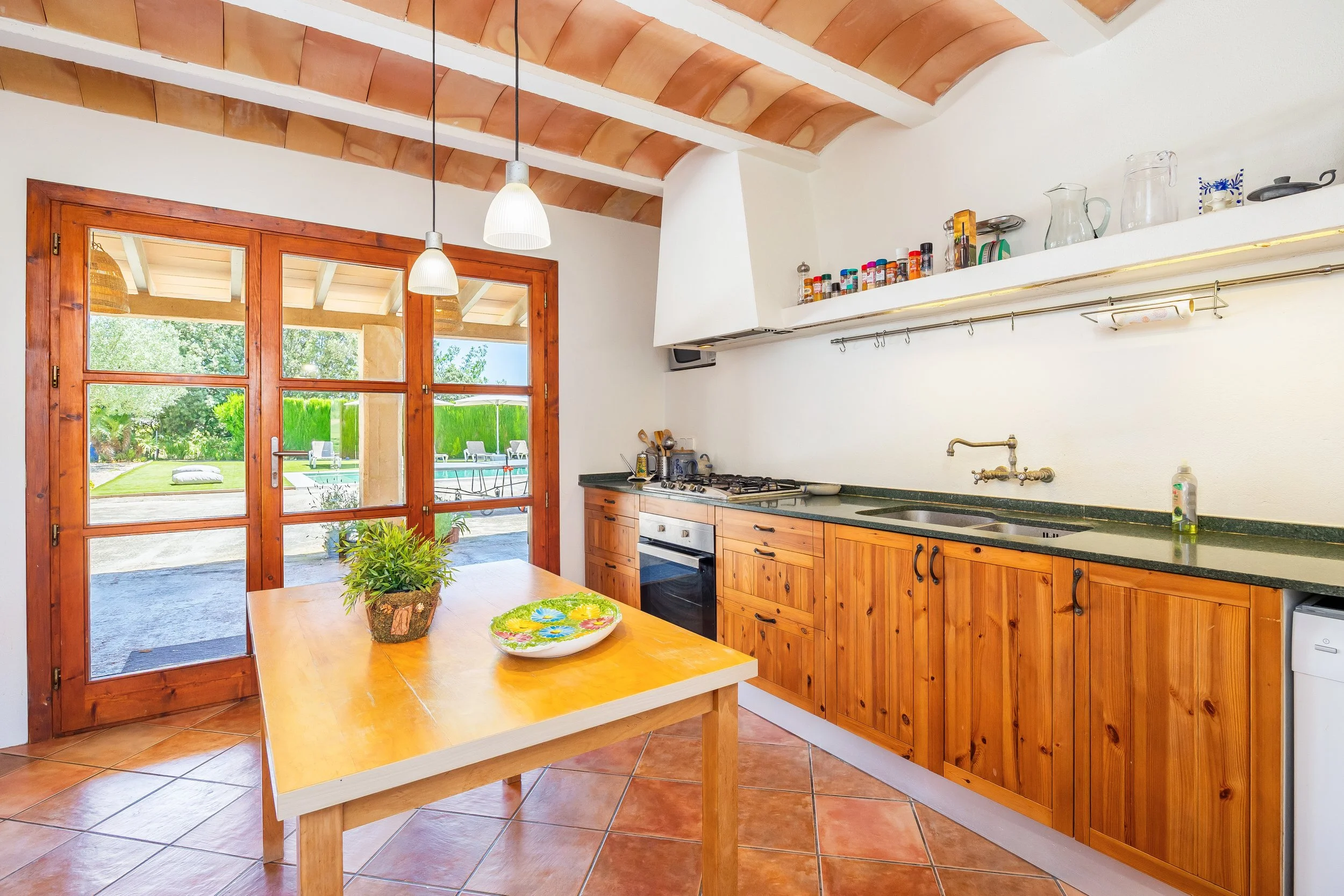 Rural house interior with natural light and traditional Mediterranean style real estate photography in Mallorca