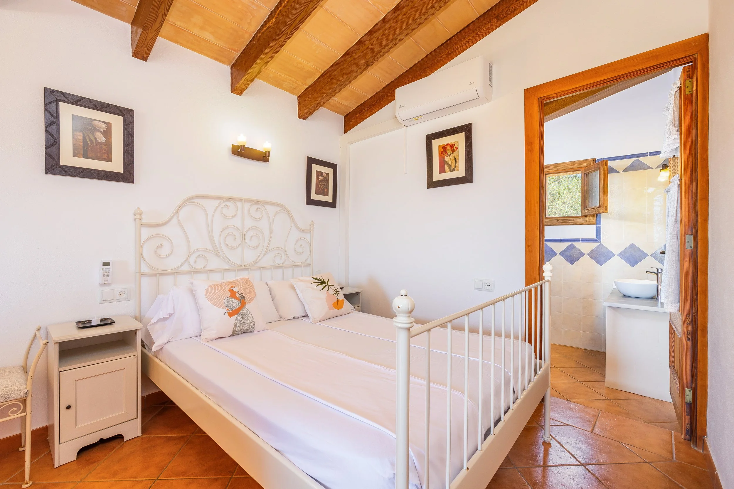Traditional Mallorcan interior at Can Churi with rustic details and natural light real estate photography